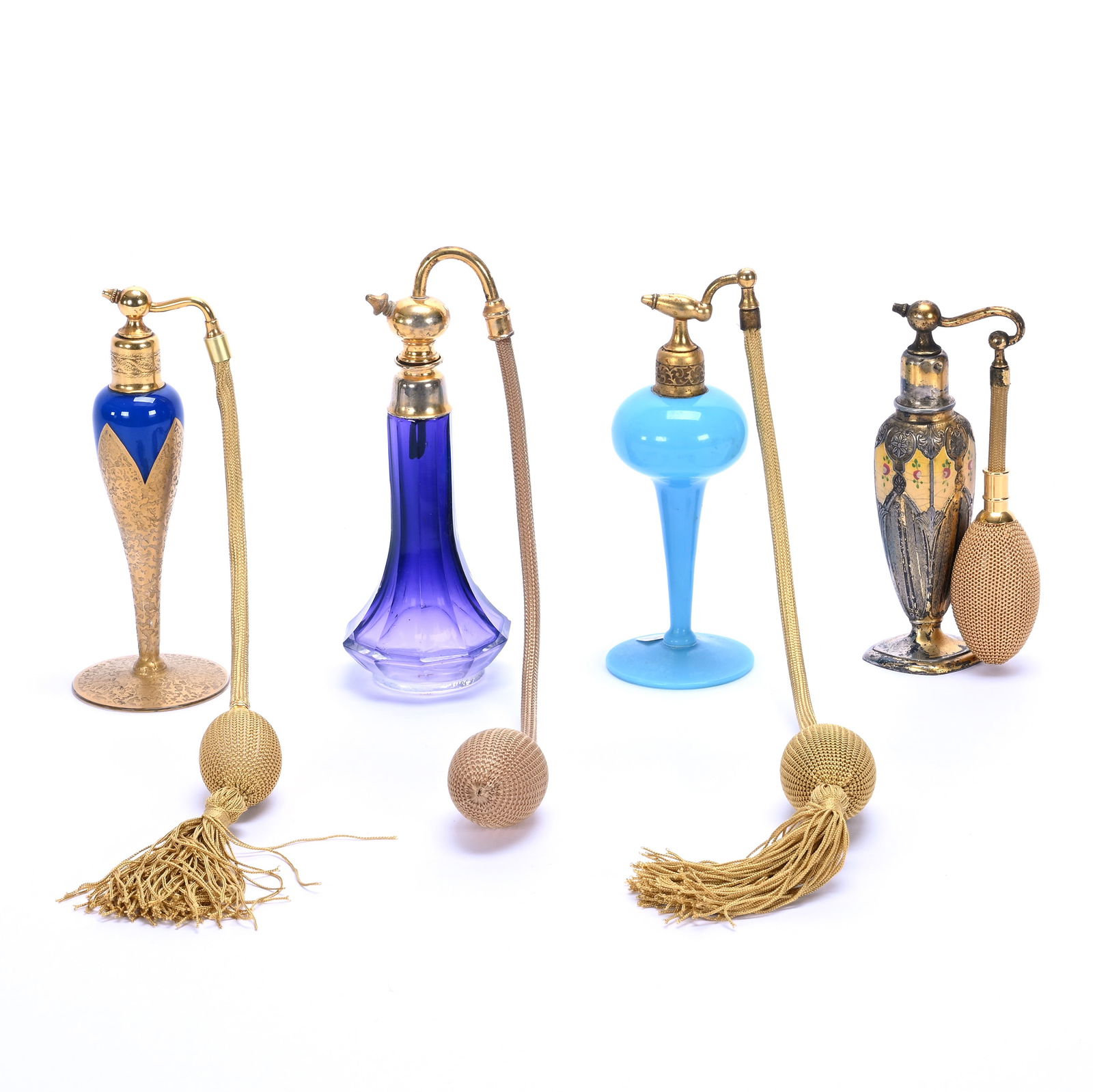 (4) Atomizers, Art Glass: (4) Atomizers, Art Glass, (1) 6.25", Unmarked Devilbiss, Dark Blue With Extensive Gold Highlights, (1) 6" Blue Opaline Art Glass, (1) 6.5" Unmarked Moser, Amethyst Shading To Clear, (1) 5.5" All