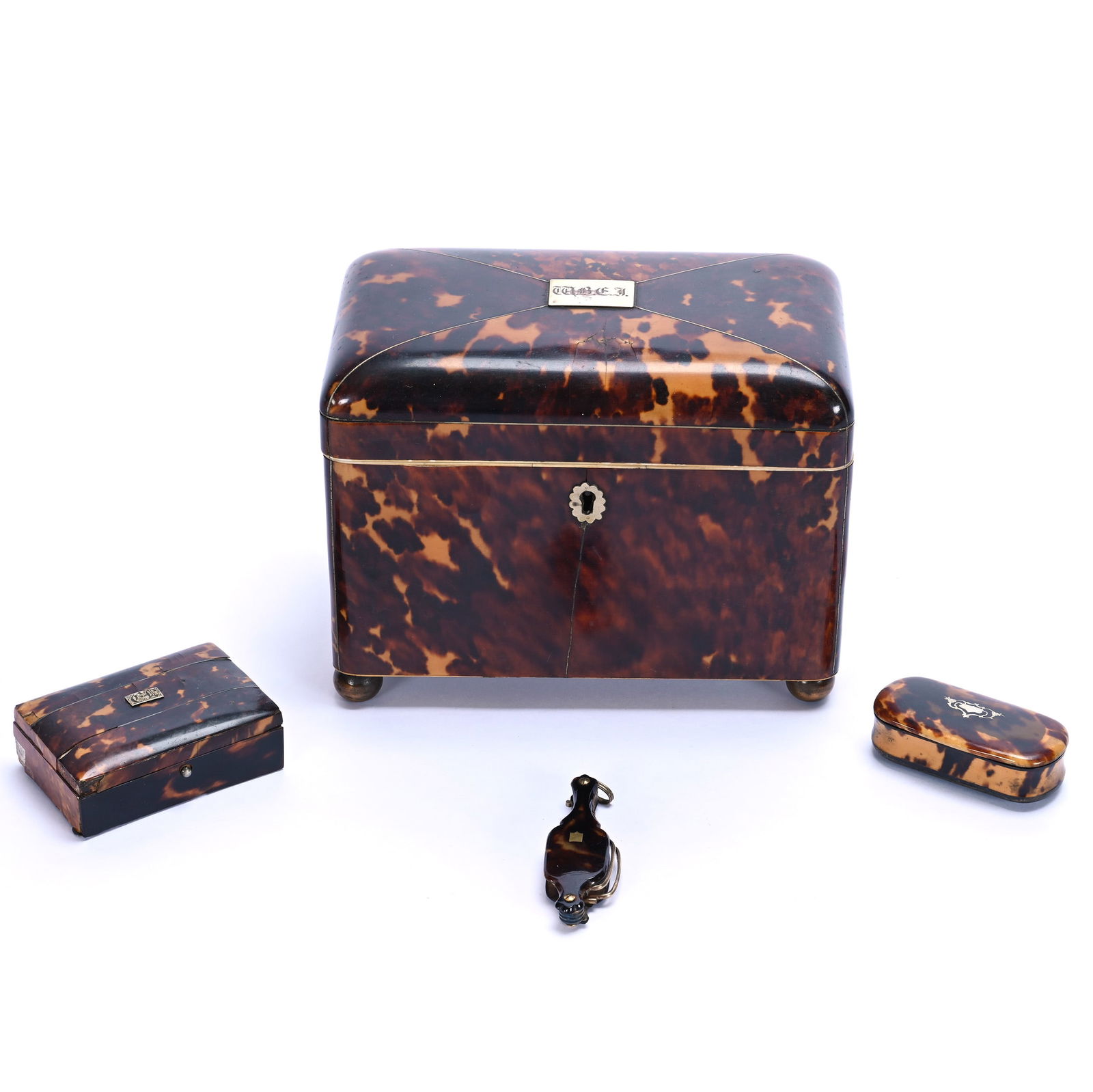 (4) Items With Colored Tortoise Designs: (4) Items With Colored Tortoise Designs, (1)5.5" x 7" x 4.25" 19th Century English Regency Tea Caddy, (1) 3" x 2" x 1" Keepsake Box, Some Laminate Damage, (1) 2.75" x 1.25" x 0.75" Oval Pin Box, (1)