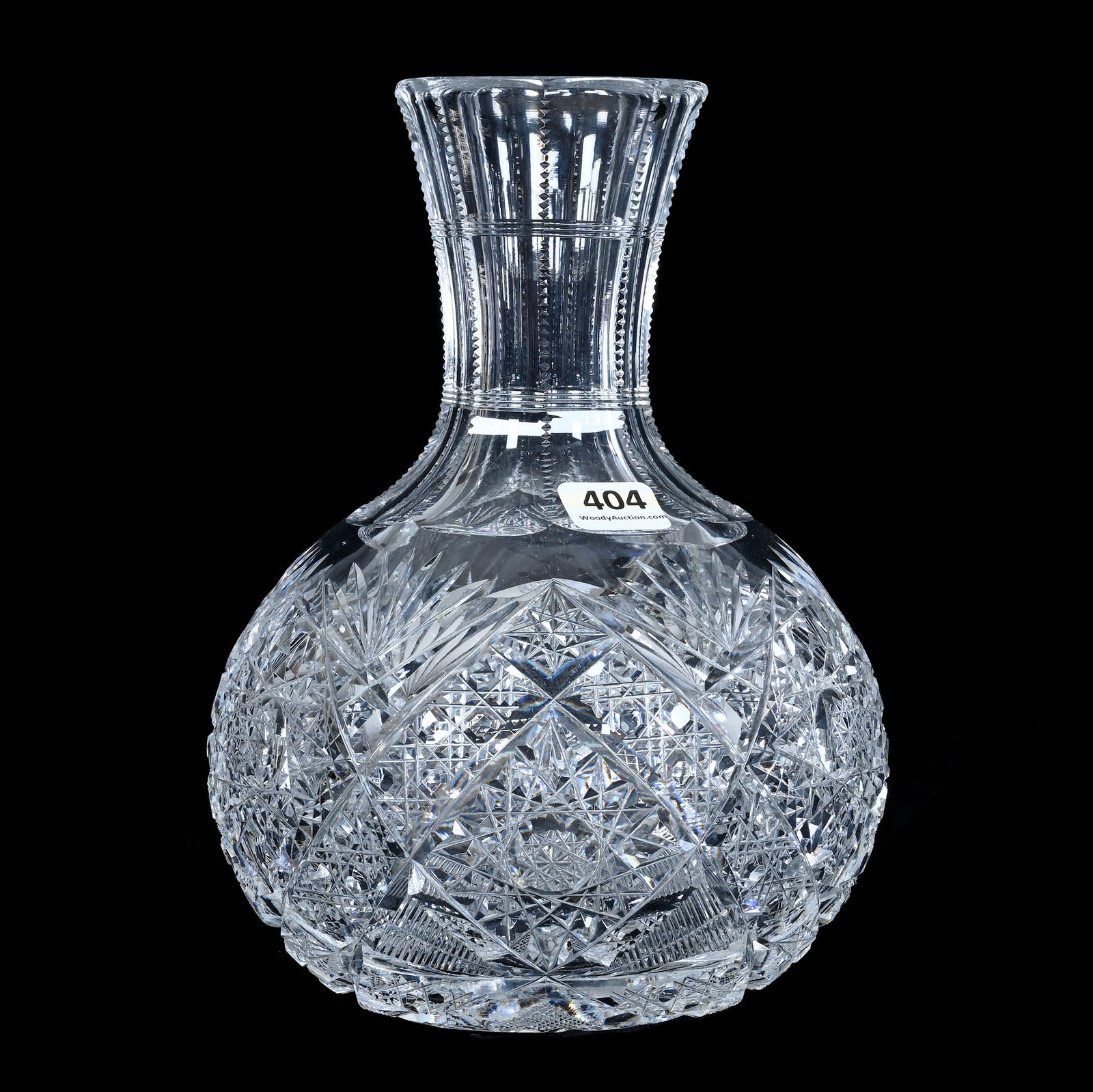 Water Carafe, American Brilliant Cut Glass: Water Carafe, American Brilliant Cut Glass, 8.25 x 5.75 x 5.75 Inches, Hobstar, Cane And Fan Motif, Ray Cut Base, 3.8 Pounds, Grady And Annette Hite Collection.