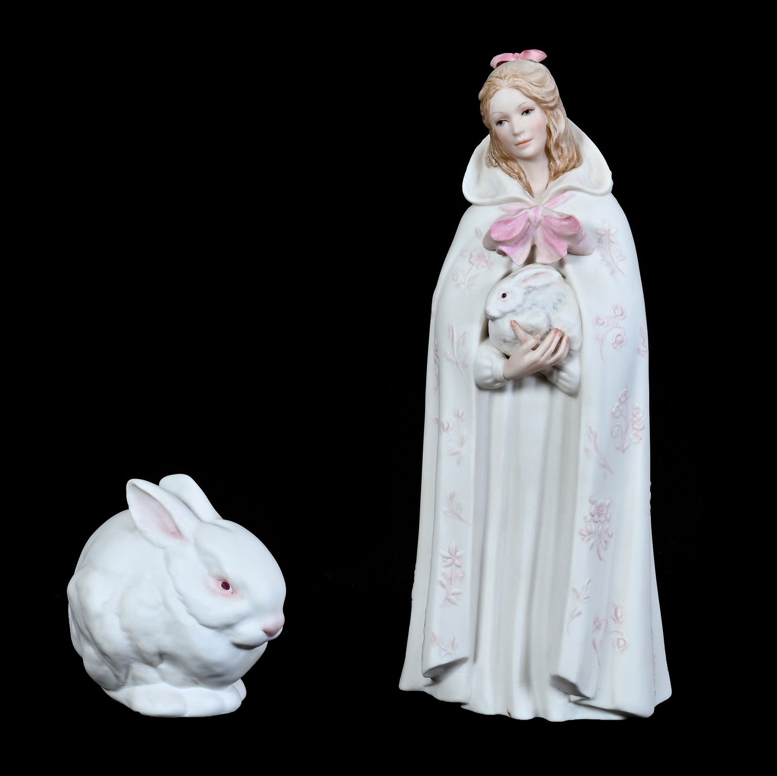 (2) Cybis Figurines: (2) Cybis Figurines (1) 10" x 4" Titled "Melissa" Also Known As "Pink Dough Girl With Rabbit", (1) 3.5" x 4" Titled "Mr. Snowball", Rabbit, 1.4 Pounds, Grady And Annette Hite Collection.