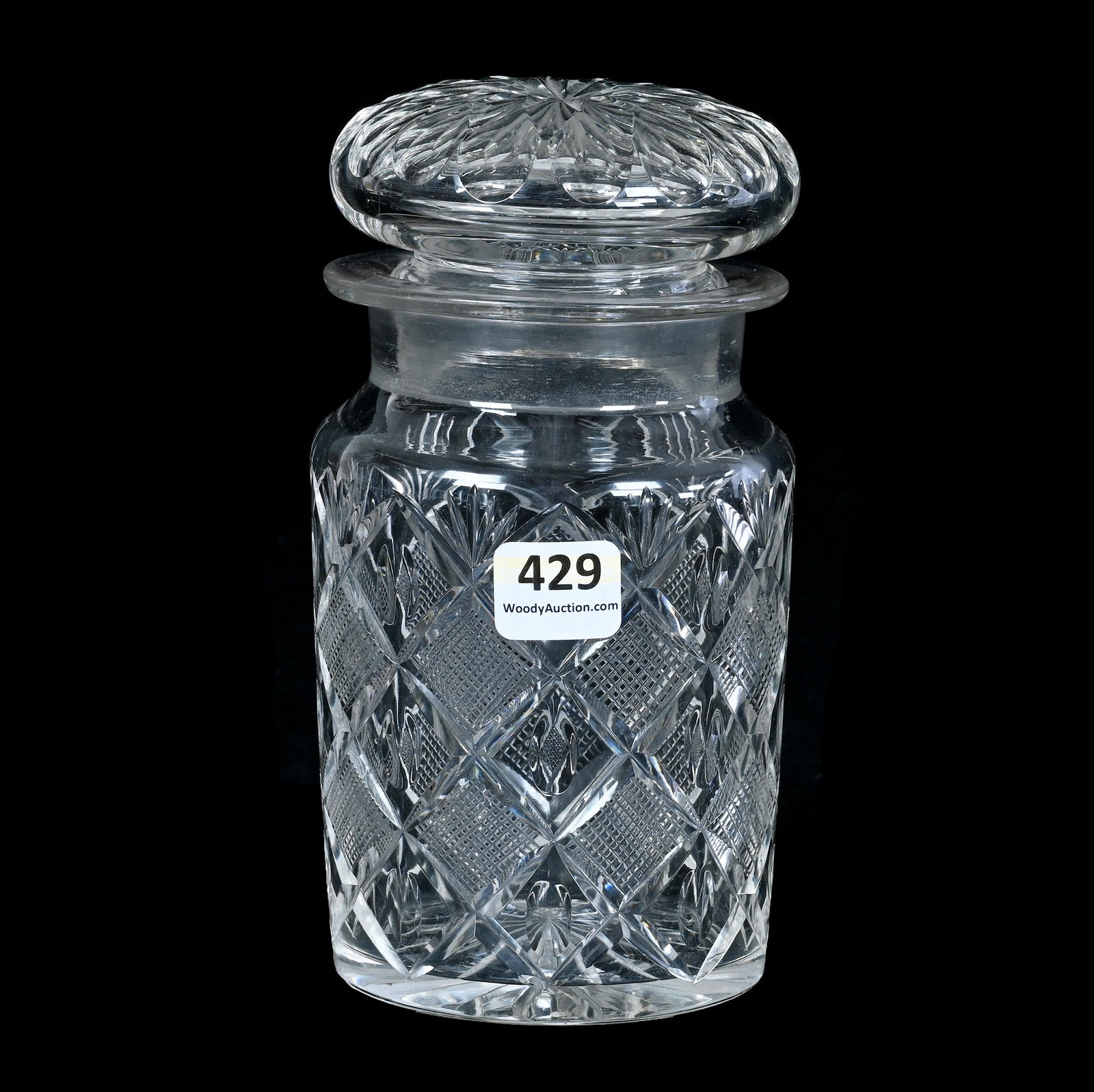 Cigarette Jar, Brilliant Period Cut Glass: Cigarette Jar, Brilliant Period Cut Glass, 6.5 x 3.5 x 3.5 Inches, Diamond, Punty, And Fan Motif, Ray Cut Base And Lid, 1.8 Pounds, Grady And Annette Hite Collection.