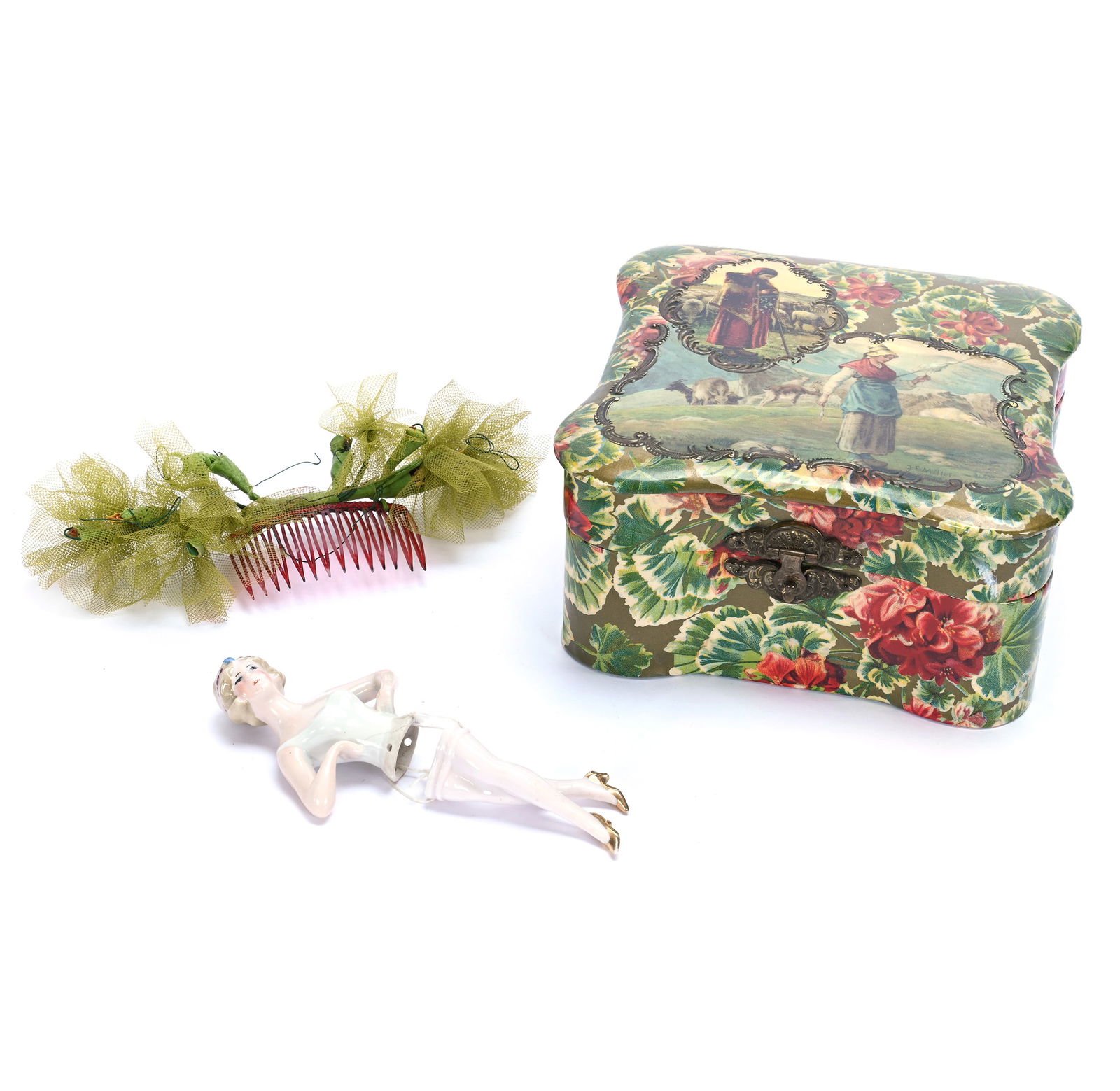 Celluloid Box And Contents: Celluloid Box And Contents, 6.75 x 7 x 3.75 Inches, Box Features Dutch Scene Of Women And Animals, Original Lining, Contents Include: German Half Doll And Paper Fold-Out Bells, 1 Pound, Grady And