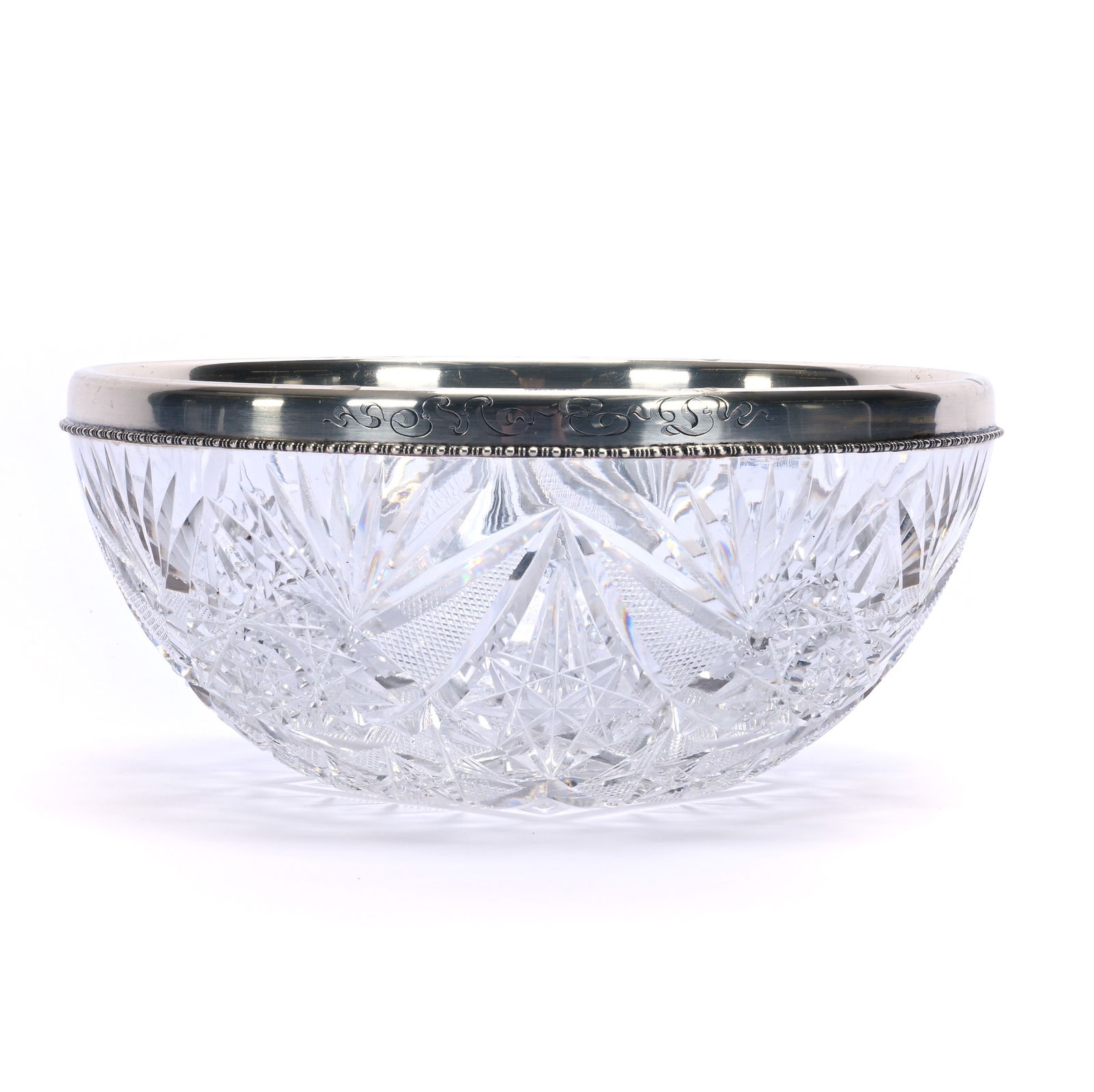 Bowl, American Brilliant Cut Glass, Libbey Star And Circle Blank Mark: Bowl, American Brilliant Cut Glass, Libbey Star And Circle Blank Mark, 9 x 9 x 4.25 Inches, Four Alternating Sections Of Hobstar, Crosscutting, Arch, And Fan Motif, Sterling Silver Rim By Gorham #D725