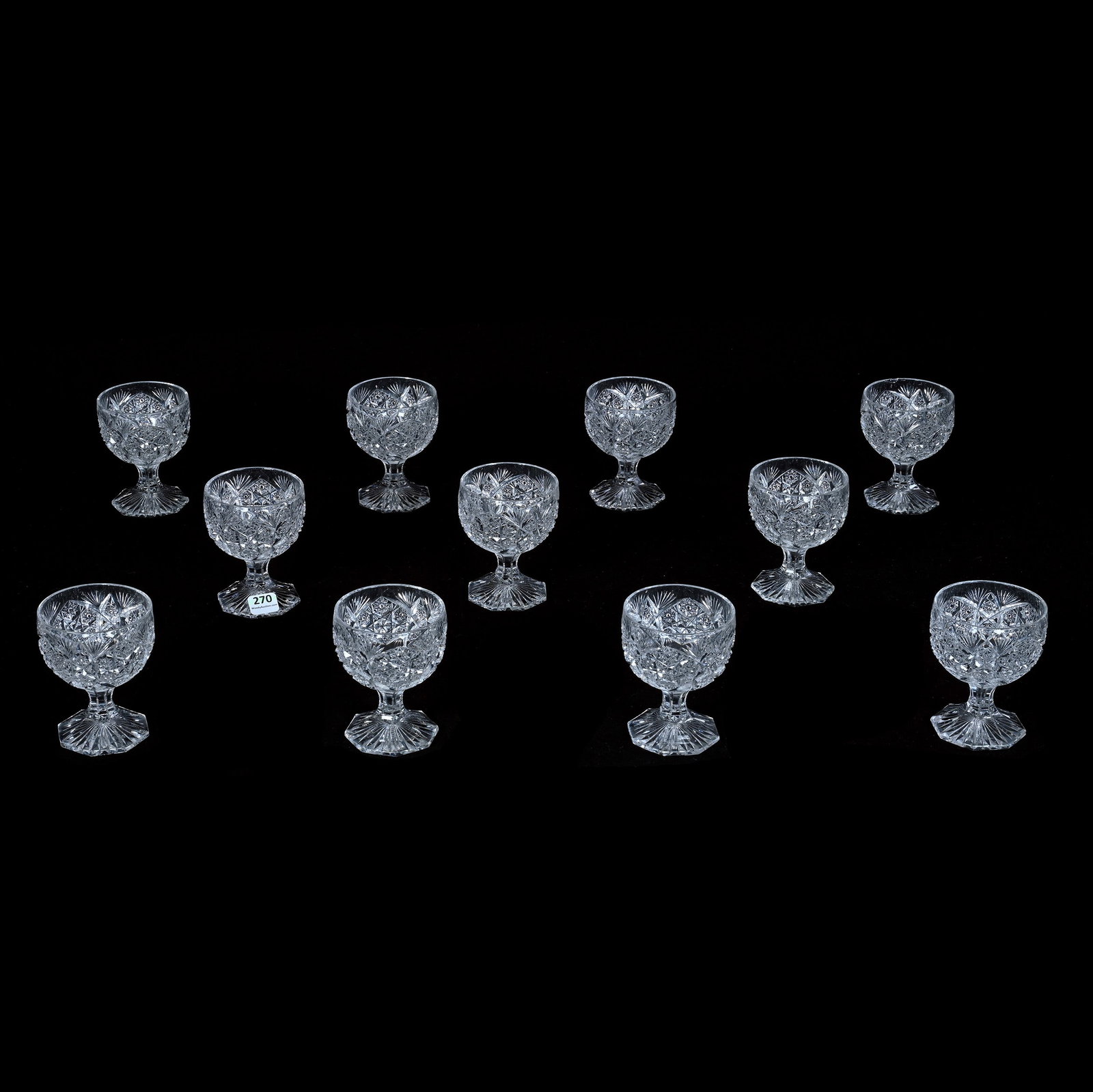 (11) Pedestal Punch Cups, American Brilliant Cut Glass: (11) Pedestal Punch Cups, American Brilliant Cut Glass, 3.75 x 3 x 3 Inches, Hobstar Cluster, Vesica, And Fan Motif, Eight Sided Petticoat Ray Cut Foot, (2) Cups With Rim Chips, 6.2 Pounds, Bill Sanda