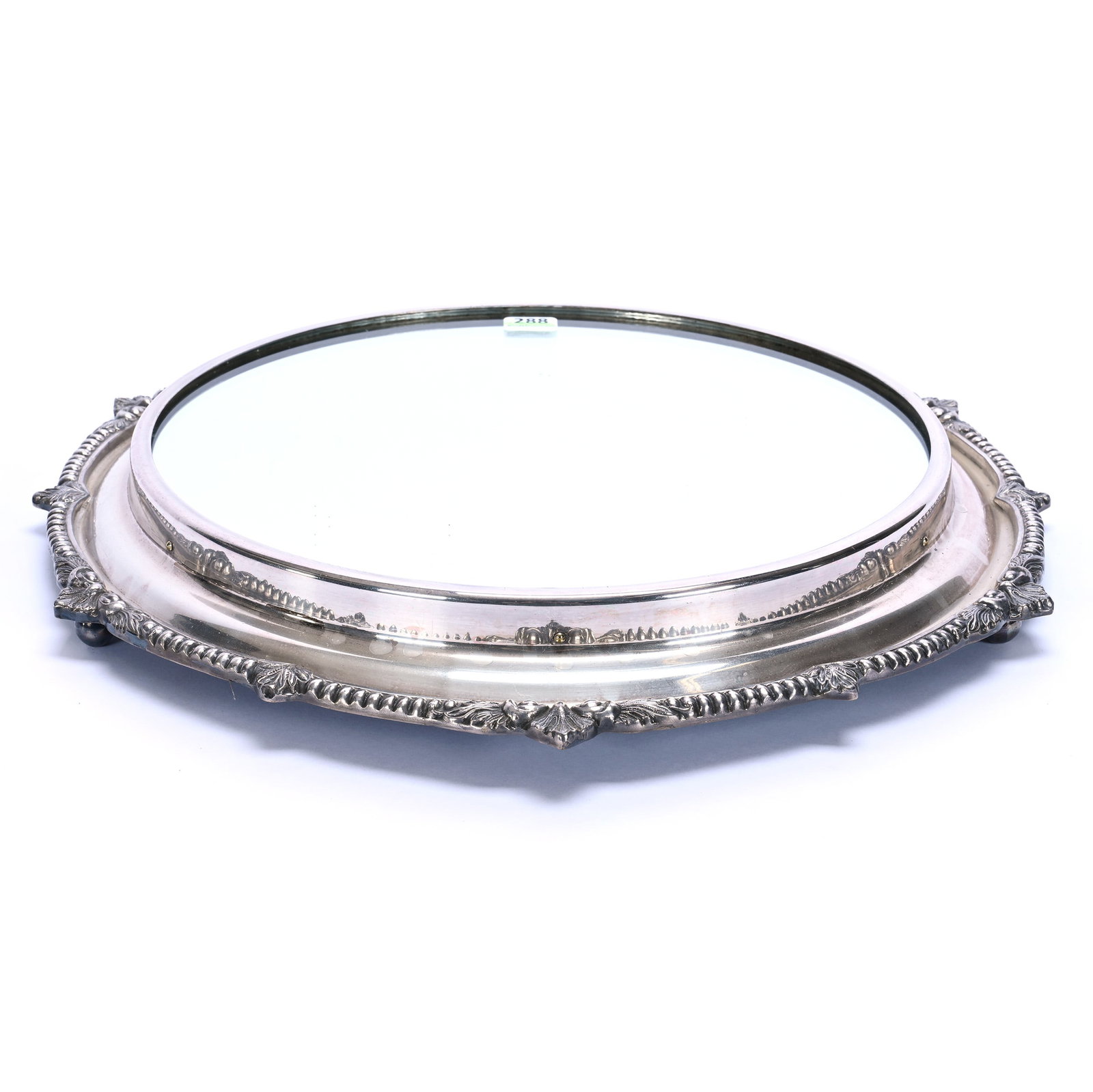 Mirrored Plateau, Elaborate Unmarked Silverplate Frame: Mirrored Plateau, Elaborate Unmarked Silverplate Frame, 16 x 16 x 1.75 Inches, 11.5" Diameter Mirror, 6.3 Pounds, Bill Sandars Collection.