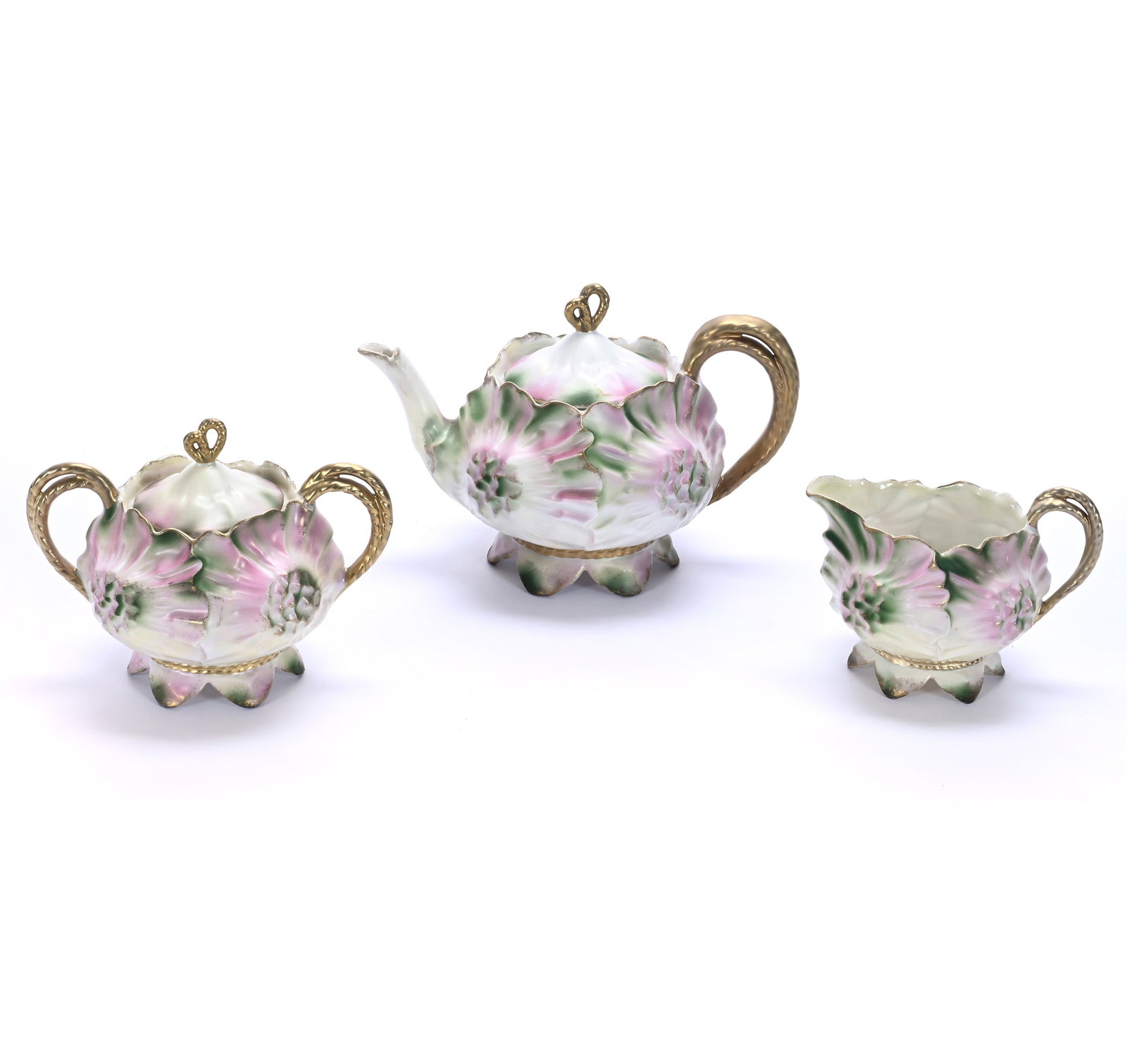 Tea Set, Unmarked R.S. Prussia, Sunflower Mold: Tea Set, Unmarked R.S. Prussia, Sunflower Mold, 5.25 x 7.5 x 5 Inches, Green, Pink And White Satin Finish With Gold Highlights, Tea Pot With Matching Creamer And Sugar, Rim Chip In Teapot, 1.4 Pounds.