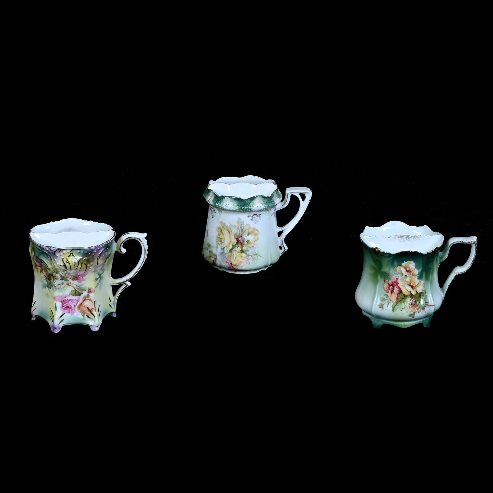 (3) Shaving Mugs, R.S. Prussia: (3) Shaving Mugs, R.S. Prussia, 3.5 x 4.75 x 3.5 Inches, (1) Yellow, Green, And Lavender With Rose And Daisy Decor, Marked R.S. Prussia, (1) Green And White With Floral Decor, Marked R.S. Prussia,