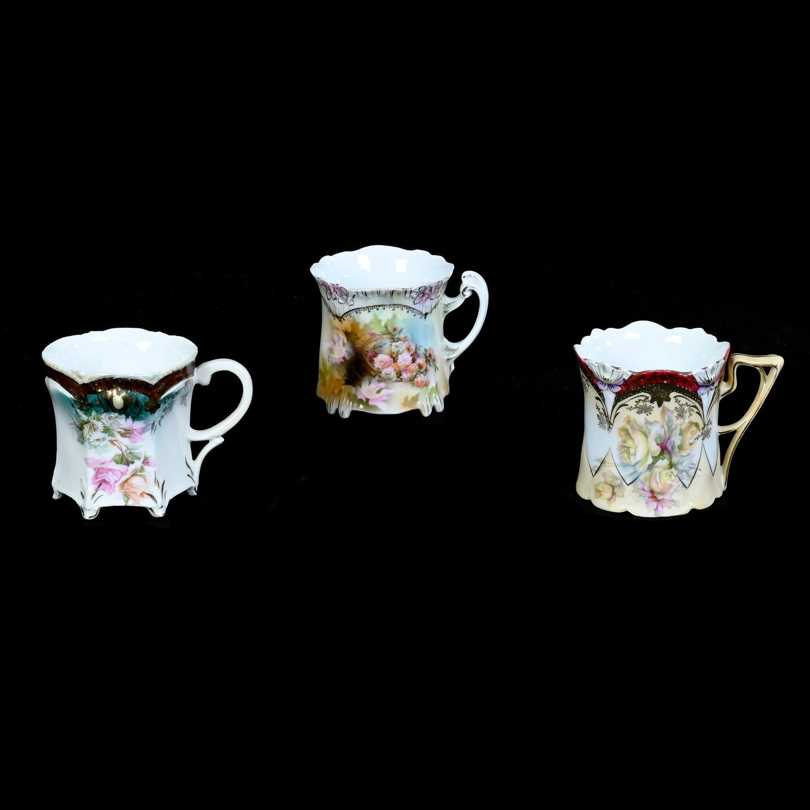 (3) Mugs, Prussia: (3) Mugs, Prussia, 3.5 x 4.75 x 3.5 Inches, (1) Lily Mold, Cream And White With Yellow Rose Decor, Red Border, Unmarked, Faint Hairline, (1) Icicle Mold, Spilled Basket Decor, Marked R.S. Prussia, Hai