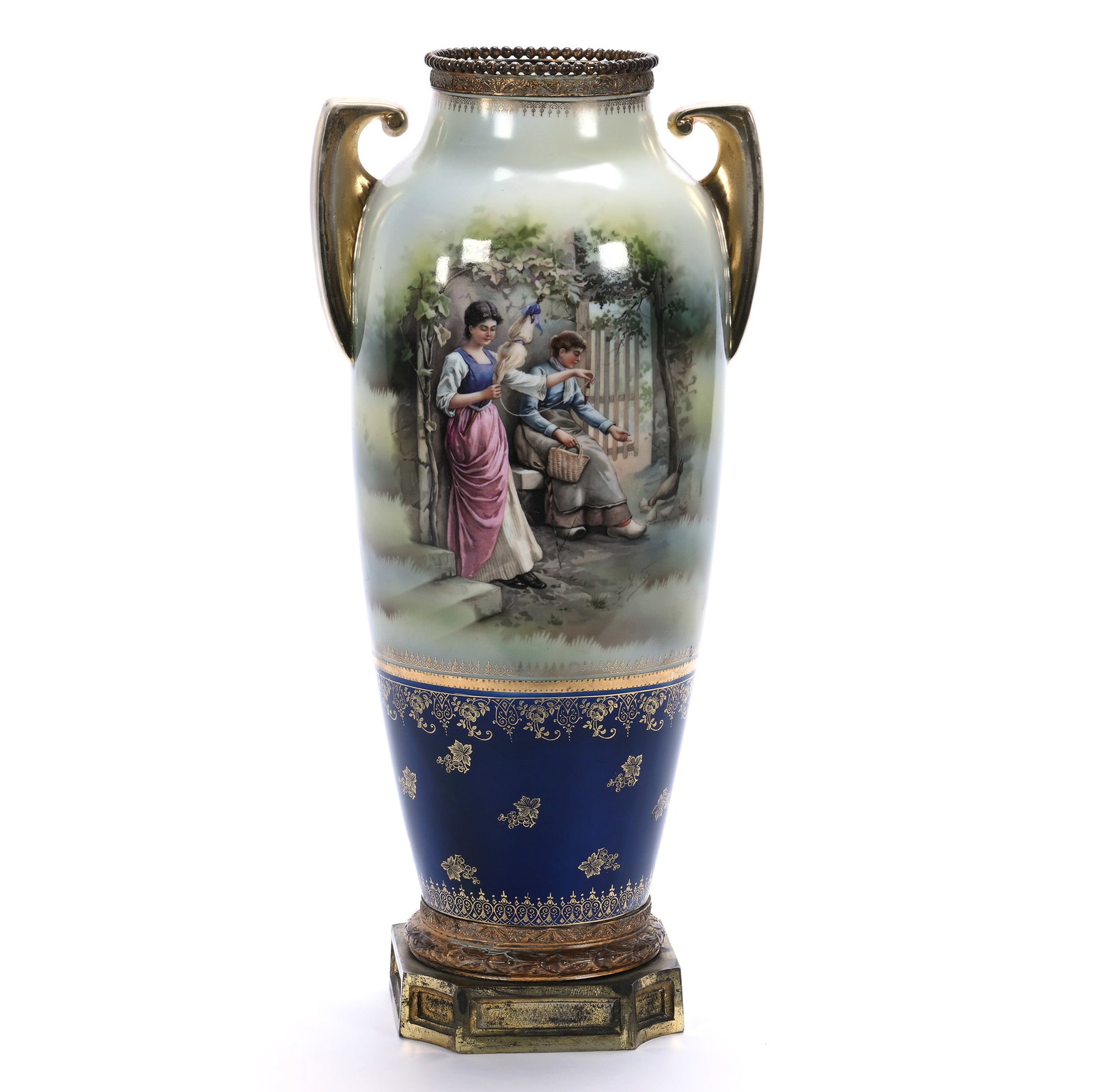 Two Handled Vase, Marked R.S. Suhl: Two Handled Vase, Marked R.S. Suhl, 16 x 7.25 x 5.75 Inches, Scene Of Woman Feeding Chicks And Woman Spooling Yarn, Cobalt Blue Border With Gold Stencil Highlights, Gilt Metal Base And Rim, 5.1