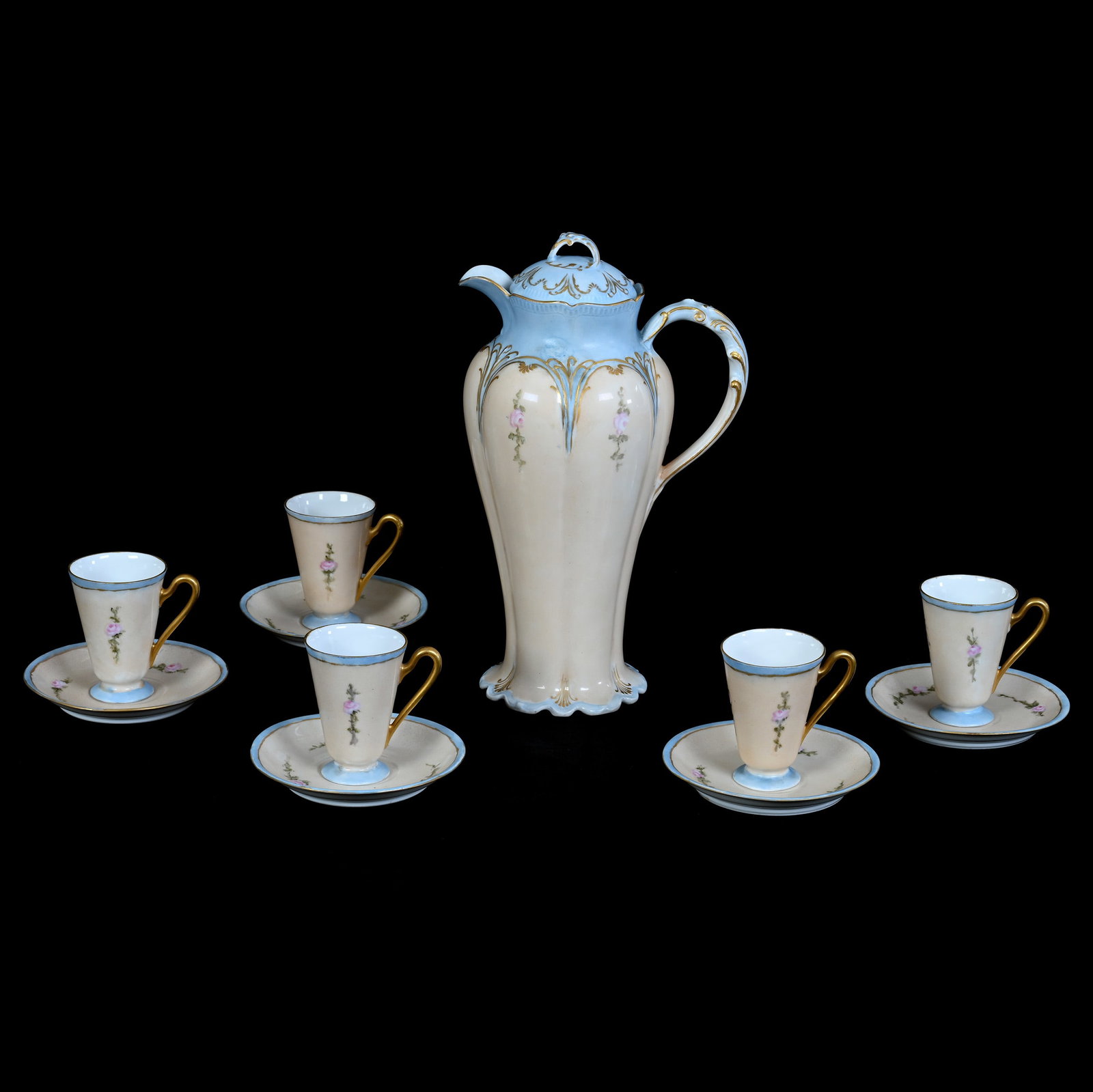 Chocolate Set, Marked Limoges: Chocolate Set, Marked Limoges, 11.25 x 6.5 x 4.75 Inches, Peach And Blue Tones With Pink Floral Decor And Gold Trim Highlights, (5) Cups And Saucers, 3 Pounds. LiveAuctioneers Invoices Must Be Paid