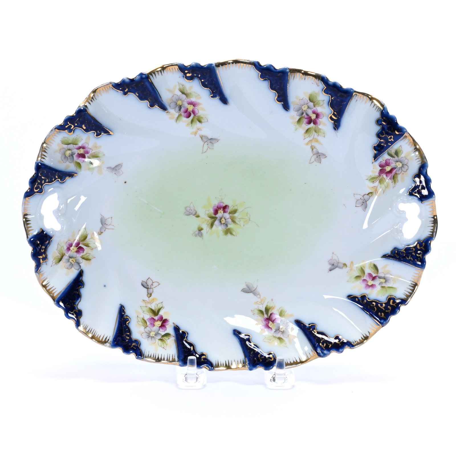 Oval Tray, Marked C.S. Germany: Oval Tray, Marked C.S. Germany, 10.5 x 7.75 x 1.5 Inches, Green And White With Cobalt Blue Border Highlights And Floral Decor, 0.9 Pounds. LiveAuctioneers Invoices Must Be Paid Using the PAY NOW /