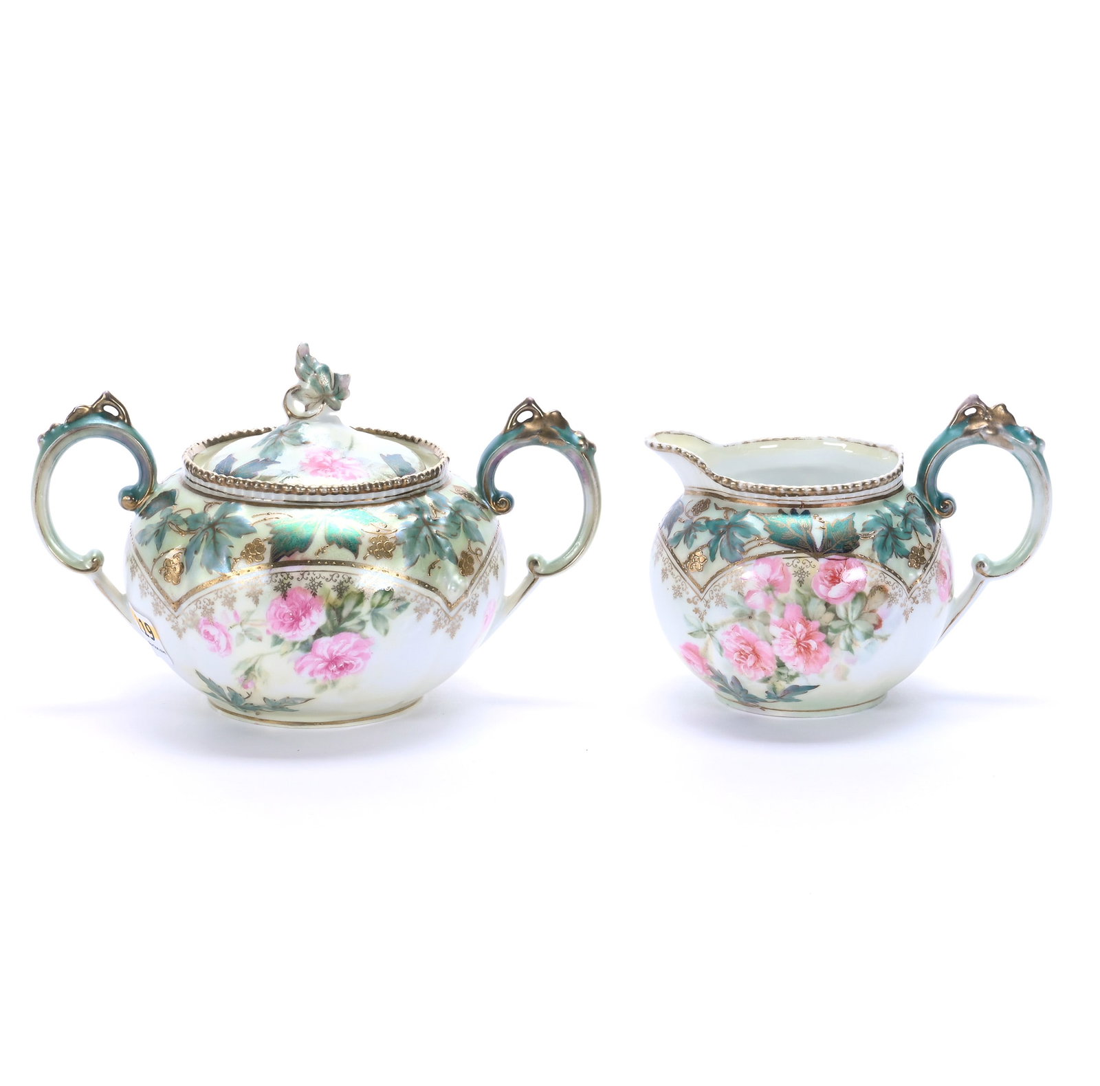 Creamer And Sugar, Marked R.S. Prussia: Creamer And Sugar, Marked R.S. Prussia, 4.5 x 6.75 x 4.5 Inches, Green And White Satin Finish With Iridescent Green Leaf Highlights, Pink Rose Decor And Gold Trim, 0.8 Pounds. LiveAuctioneers