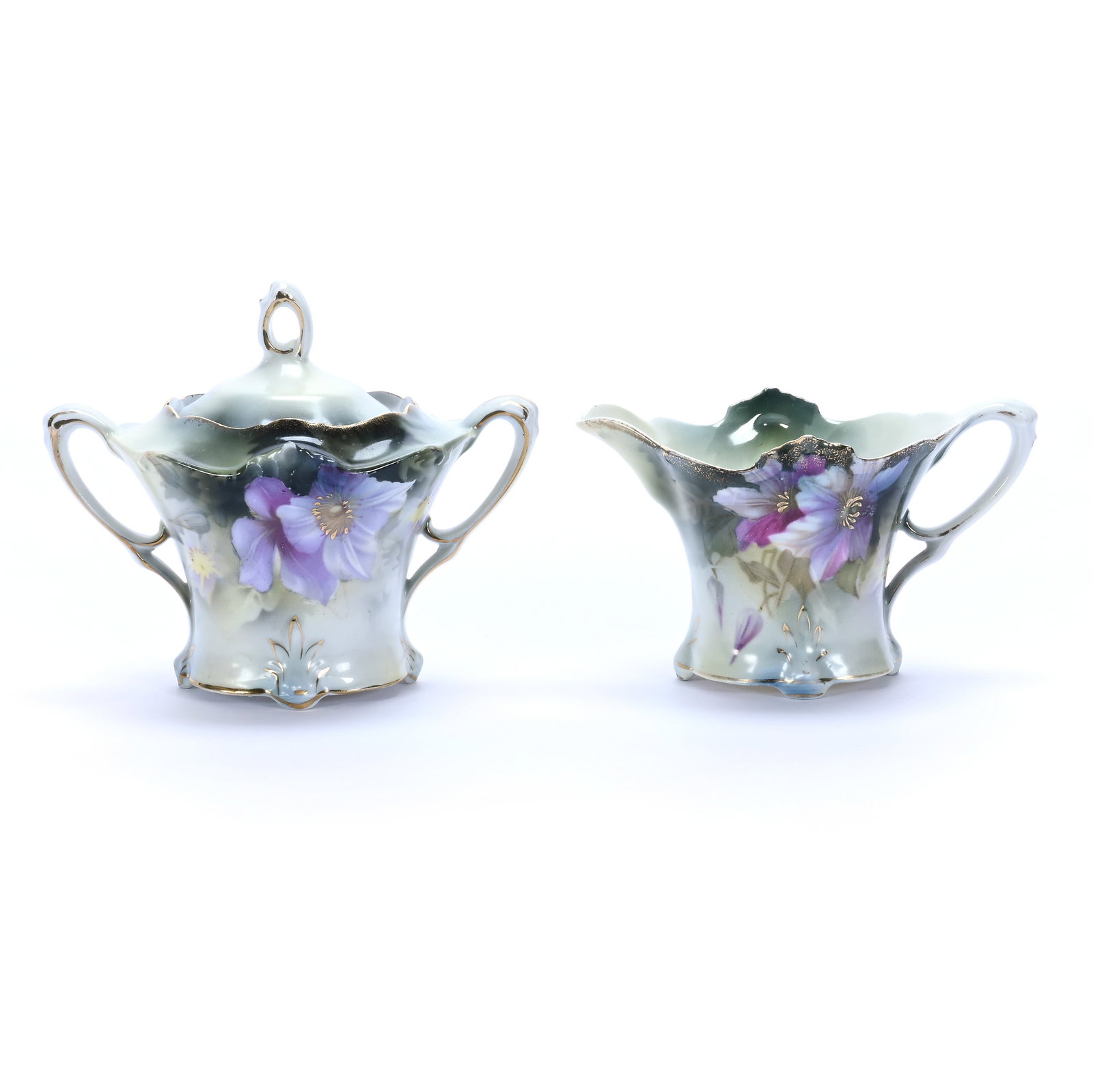 Creamer And Sugar, Marked R.S. Prussia: Creamer And Sugar, Marked R.S. Prussia, 4.75 x 5.75 x 4 Inches, Green And Yellow Tones With Violet Decor, 0.7 Pounds. LiveAuctioneers Invoices Must Be Paid Using the PAY NOW / CHECK OUT Button Which