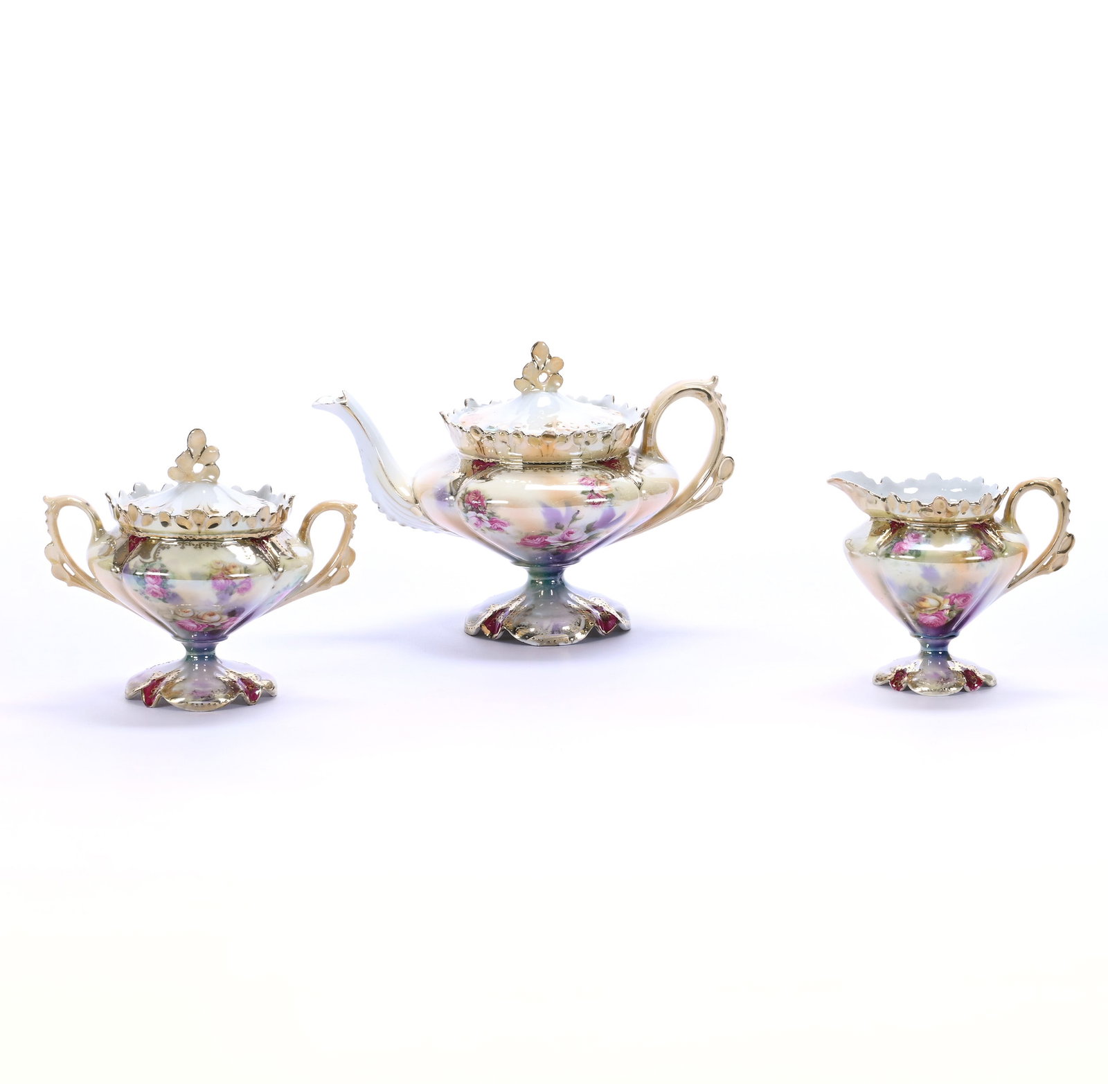 (3) Piece Pedestal Tea Set, Marked R.S. Prussia: (3) Piece Pedestal Tea Set, Marked R.S. Prussia, 5.25 x 7.5 x 5 Inches, Peach, Green, White, And Lavender Luster Finish With Rose Decor, Red And Gold Trim Highlights, Teapot With Creamer And Sugar, Ni