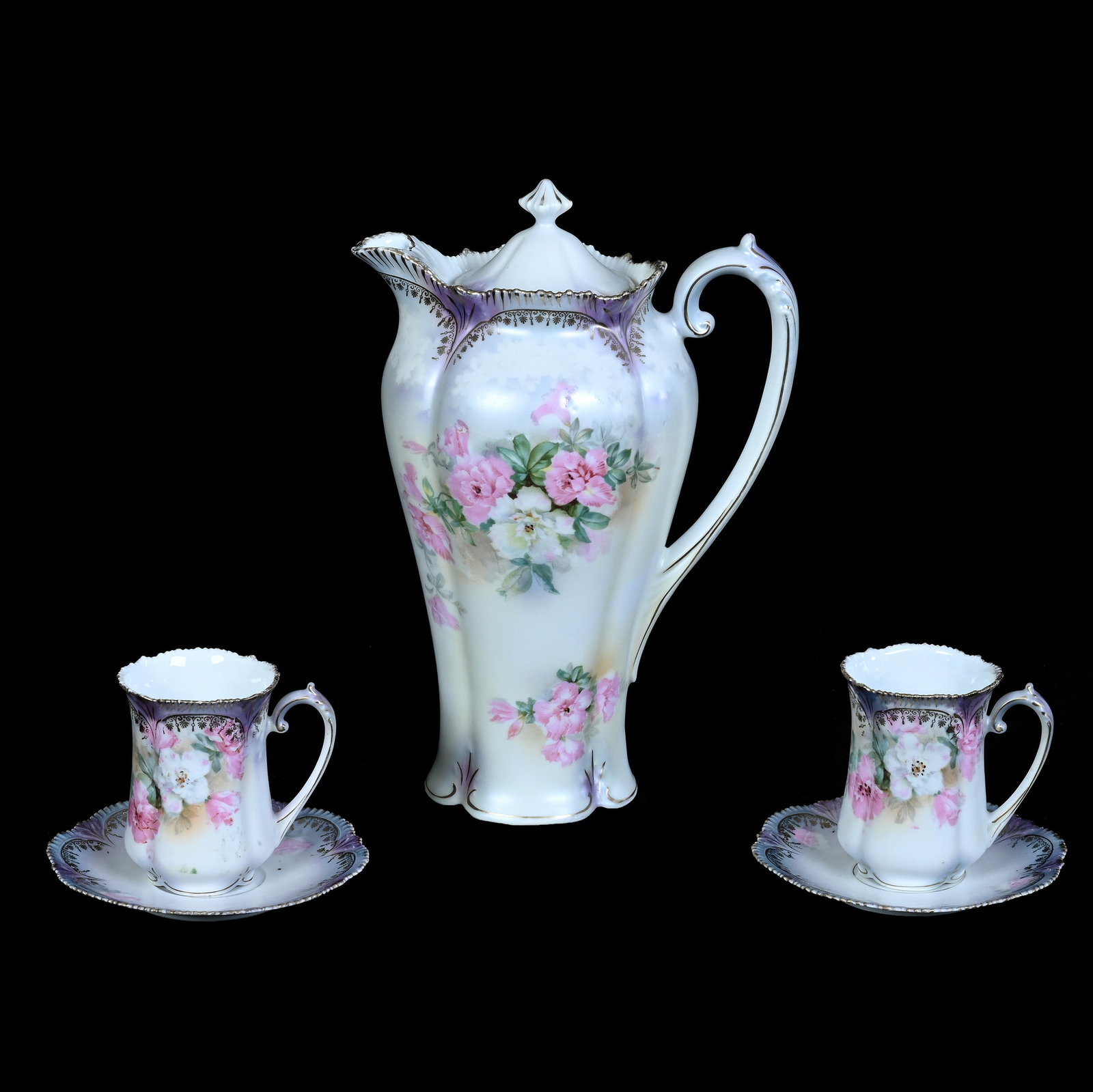 Chocolate Set, Marked R.S. Prussia: Chocolate Set, Marked R.S. Prussia, 9.75 x 6.75 x 4.5 Inches, Lavender, Yellow, And White Satin Finish With Pink And White Rose Decor, (2) 3.5" x 4.75" Cups And Saucers, 1.7 Pounds. LiveAuctioneers