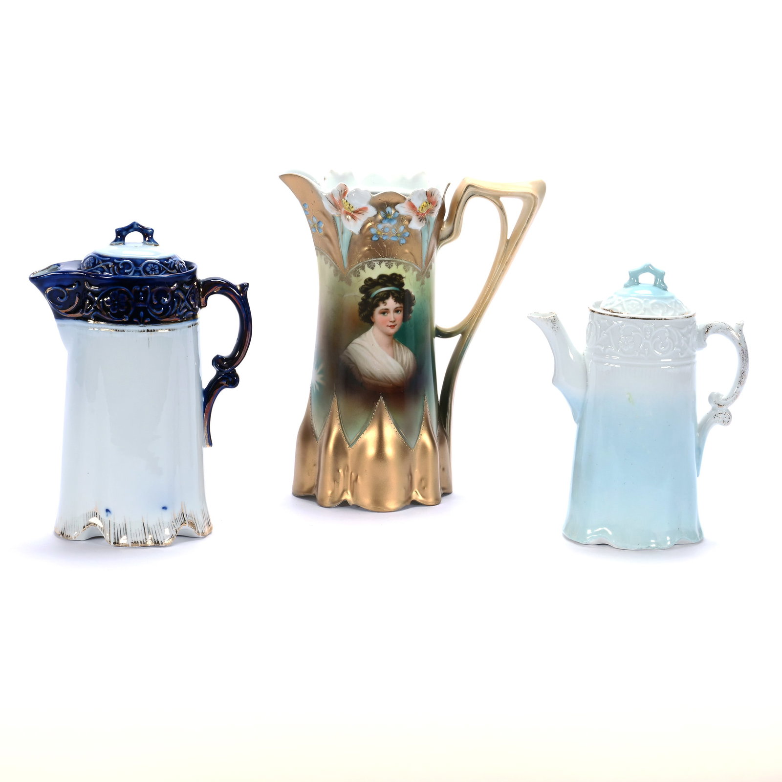 (3) Chocolate/Coffee Pots, Unmarked Prussia And Germany: (3) Chocolate/Coffee Pots, Unmarked Prussia And Germany, 9 x 7.5 x 4 Inches, (1) Lily Mold, Lebrun With Ribbon Portrait, Heavy Gold Border, No Lid, (1) 8.25" x 5.75" Cobalt Blue And White, (1) 7.5" x 