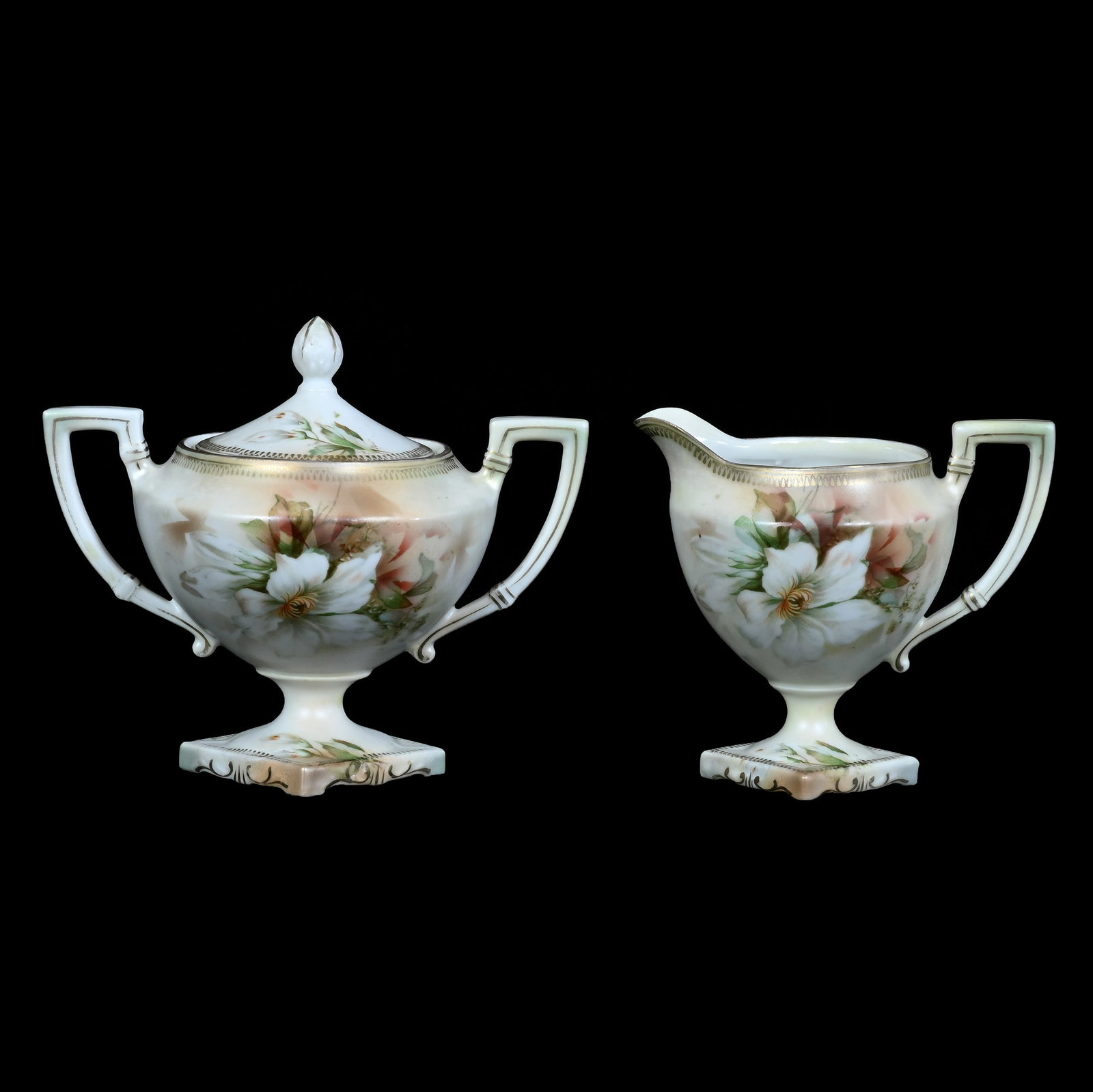 Pedestal Creamer And Sugar, Marked R.S. Prussia: Pedestal Creamer And Sugar, Marked R.S. Prussia, 5 x 5.75 x 3.75 Inches, Yellow, White, And Brown Satin Finish With White Floral Decor, 0.6 Pounds. LiveAuctioneers Invoices Must Be Paid Using the PAY 