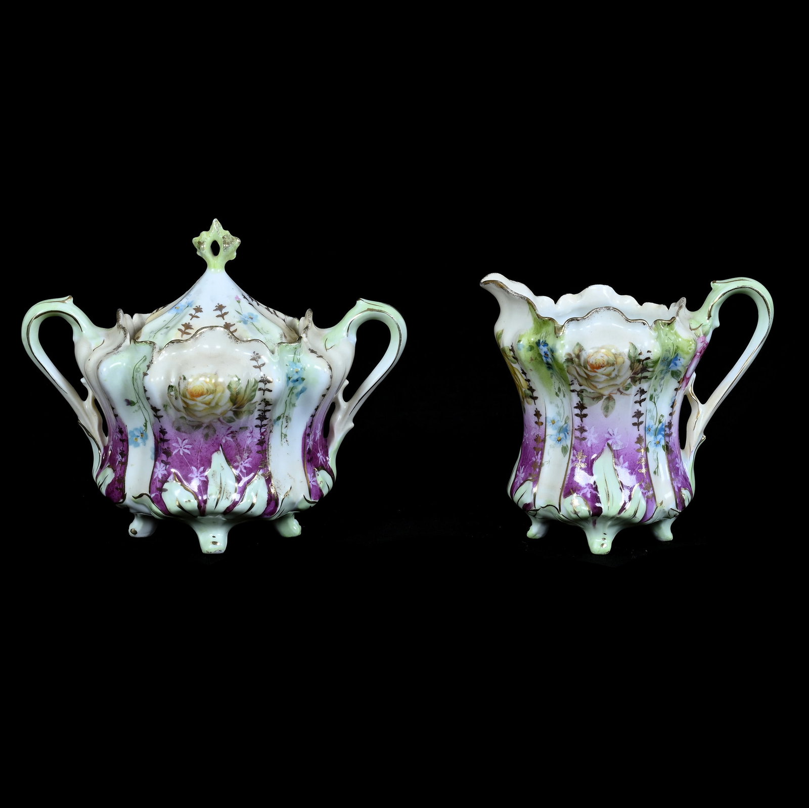 Creamer And Sugar, Unmarked R.S. Prussia: Creamer And Sugar, Unmarked R.S. Prussia, 5 x 6 x 4.25 Inches, Green, Lavender, Cream, And White Tones With Rose Decor, 0.7 Pounds. LiveAuctioneers Invoices Must Be Paid Using the PAY NOW / CHECK OUT