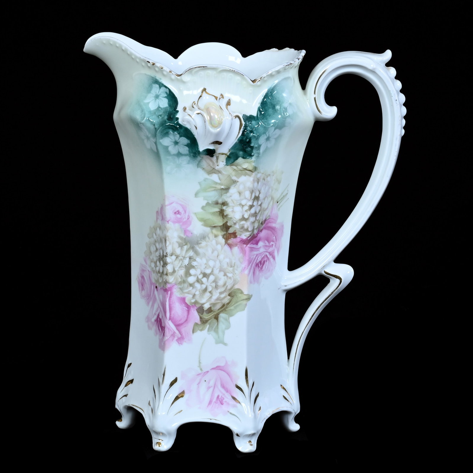 Footed Six-Sided Tankard, Marked R.S. Prussia: Footed Six-Sided Tankard, Marked R.S. Prussia, 10.5 x 8.25 x 5.25 Inches, Green And White Tones With Snowball And Rose Decor, Rim Chip, 2.2 Pounds. LiveAuctioneers Invoices Must Be Paid Using the PAY