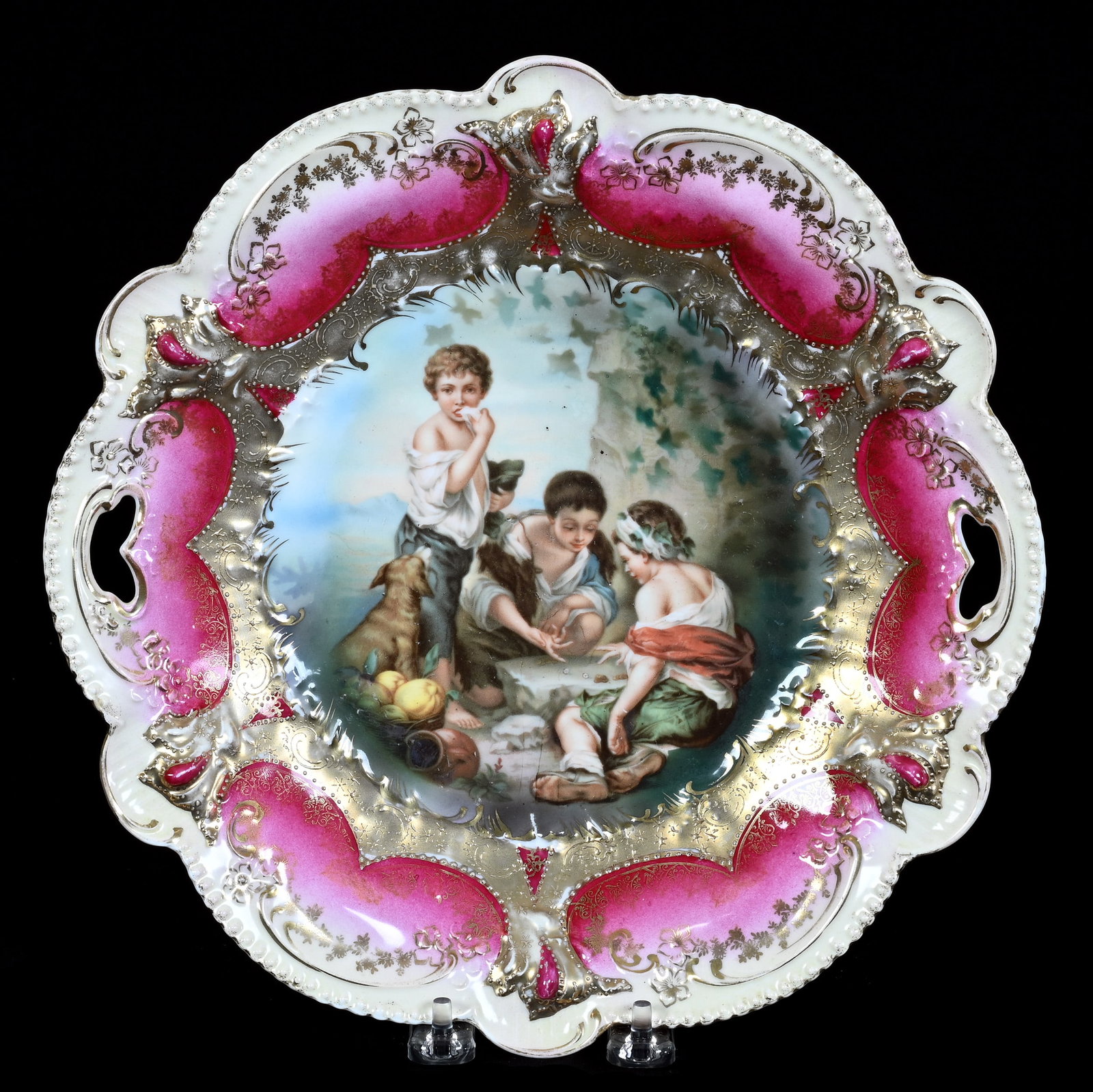 Two Handled Cake Plate, Marked R.S. Prussia: Two Handled Cake Plate, Marked R.S. Prussia, 11 x 11 x 1.5 Inches, Dice Throwers Scenic Decor, Gold, Red, And Cream Border, Light Gold Wear, 1.1 Pounds. LiveAuctioneers Invoices Must Be Paid Using the