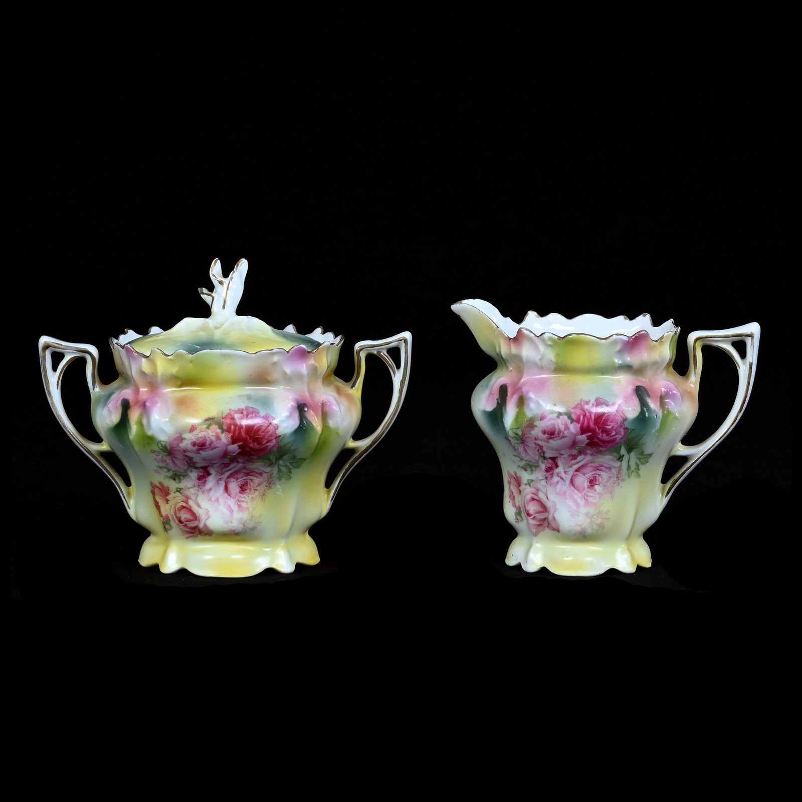 Creamer And Sugar, Marked R.S. Prussia, Iris Mold: Creamer And Sugar, Marked R.S. Prussia, Iris Mold, 4.5 x 5.25 x 4 Inches, Green, Yellow, And Pink Tones With Pink Rose Decor, Small Rim Nick On Sugar Lid, 0.8 Pounds. LiveAuctioneers Invoices Must Be