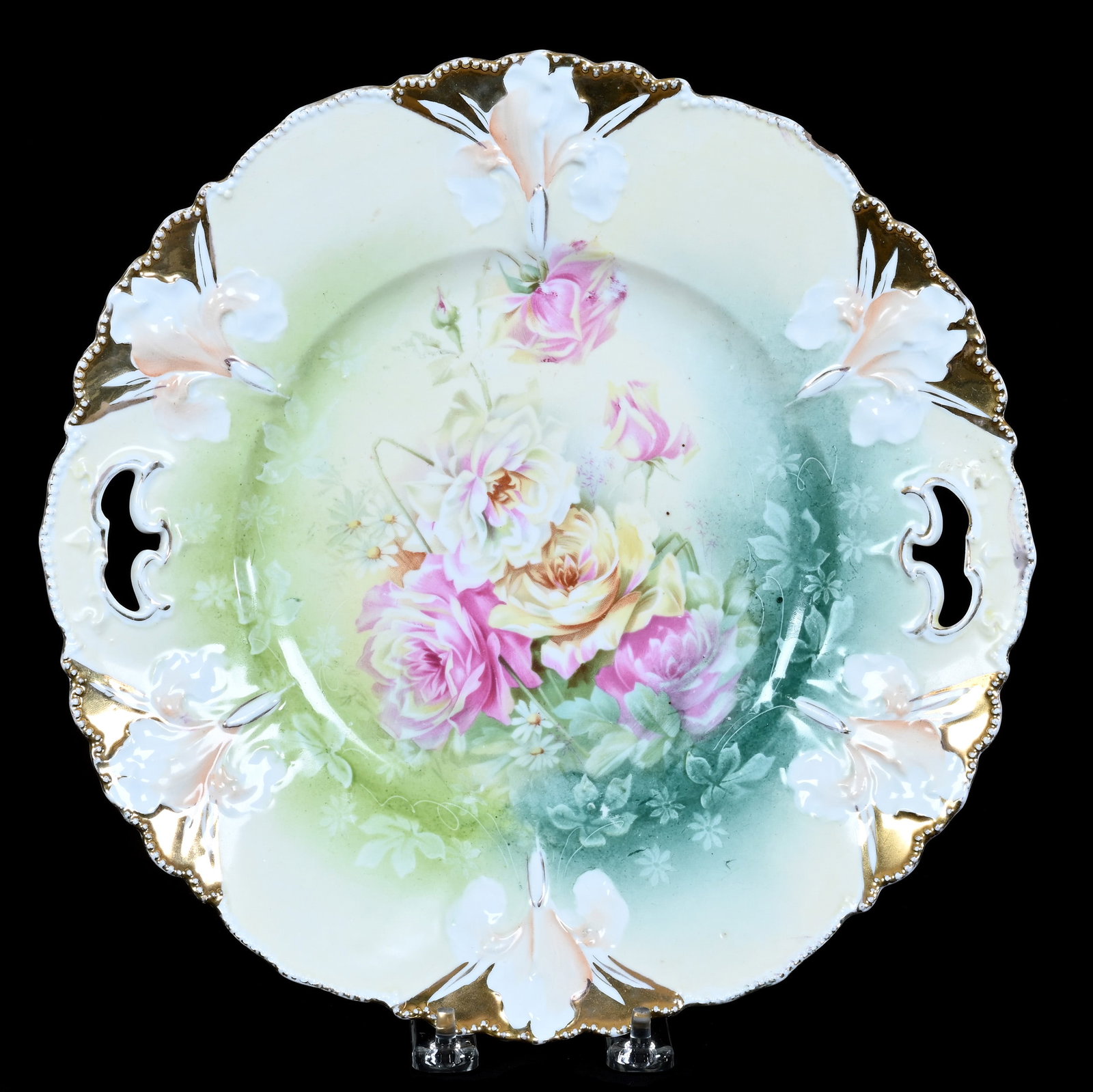 Two Handled Cake Plate, Marked R.S. Prussia, Iris Variation Mold: Two Handled Cake Plate, Marked R.S. Prussia, Iris Variation Mold, 11.25 x 11.25 x 1.5 Inches, Green, Yellow, And Orange Tones With Rose Decor, Gold Highlights, Hard To See Rim Chip, 1.3 Pounds. LiveAu
