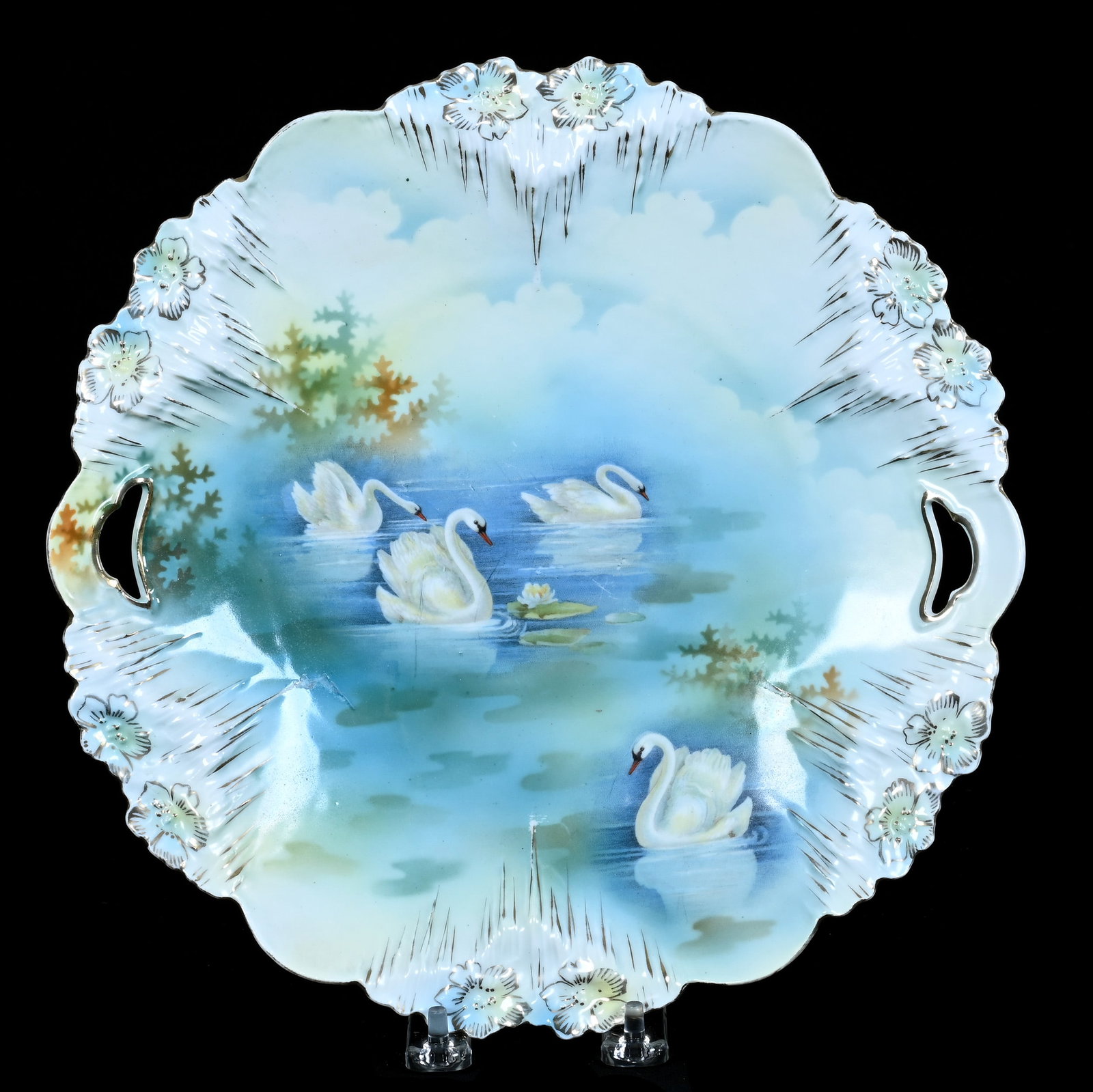 Two Handled Cake Plate, Marked R.S. Prussia, Icicle Mold: Two Handled Cake Plate, Marked R.S. Prussia, Icicle Mold, 11 x 11 x 1.5 Inches, Swan Scenic Decor, 1.2 Pounds. LiveAuctioneers Invoices Must Be Paid Using the PAY NOW / CHECK OUT Button Which