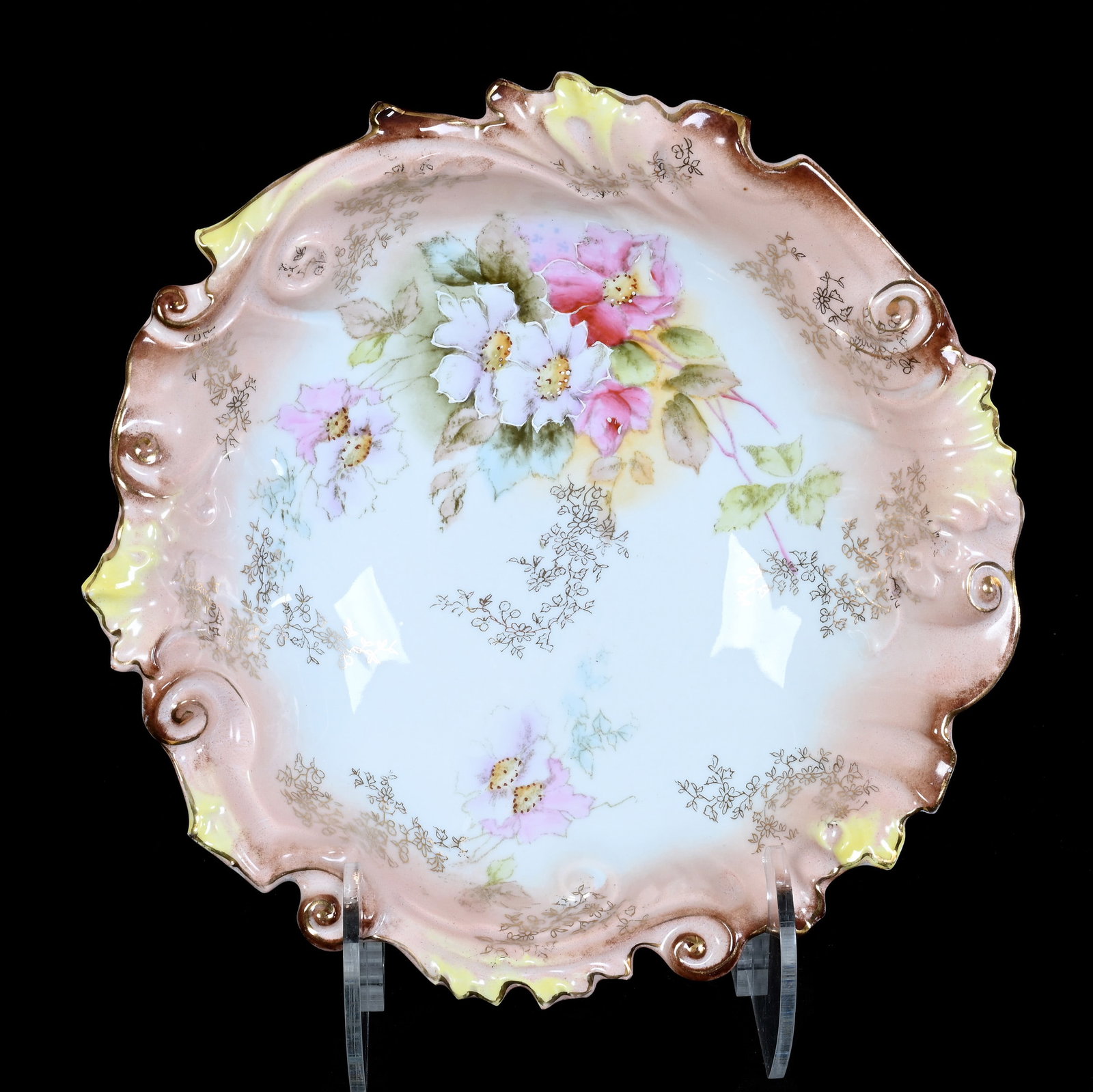 Bowl, Early Unmarked Prussia: Bowl, Early Unmarked Prussia, 10.25 x 10.25 x 2.5 Inches, Peach, Brown, Yellow, And White Tones With Floral Decor, Gold Stencil Highlights, 1.4 Pounds. LiveAuctioneers Invoices Must Be Paid Using the