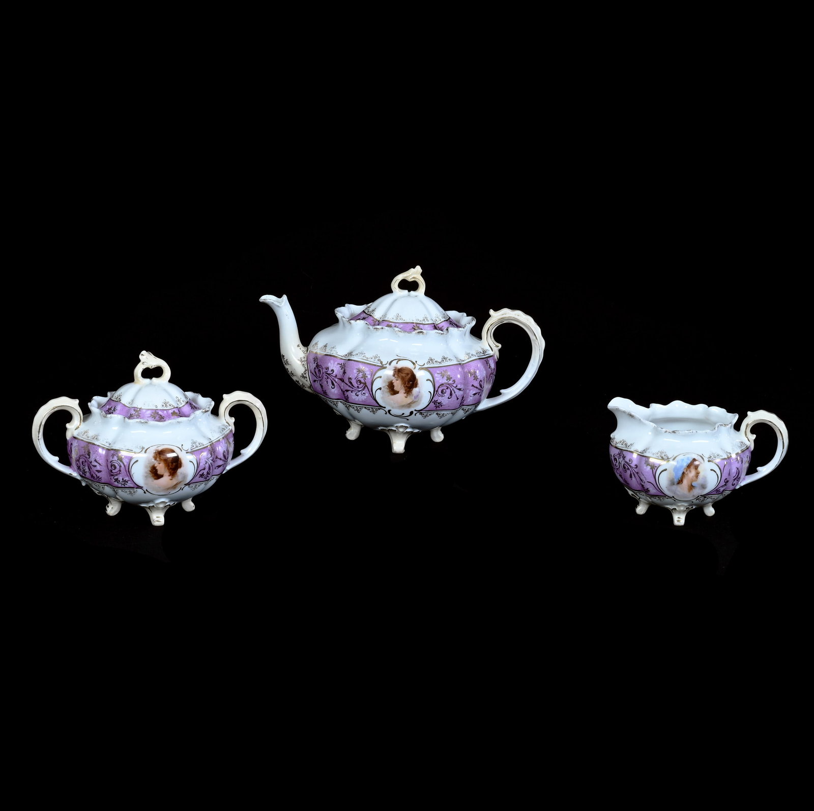 (3) Piece Tea Set, Unmarked R.S. Prussia: (3) Piece Tea Set, Unmarked R.S. Prussia, 5.25 x 8.25 x 5.5 Inches, White With Lavender Band And Cream Highlights, Medallion Portrait Of Young Woman, Teapot, Creamer, And Sugar, Sugar Lid Has Chip