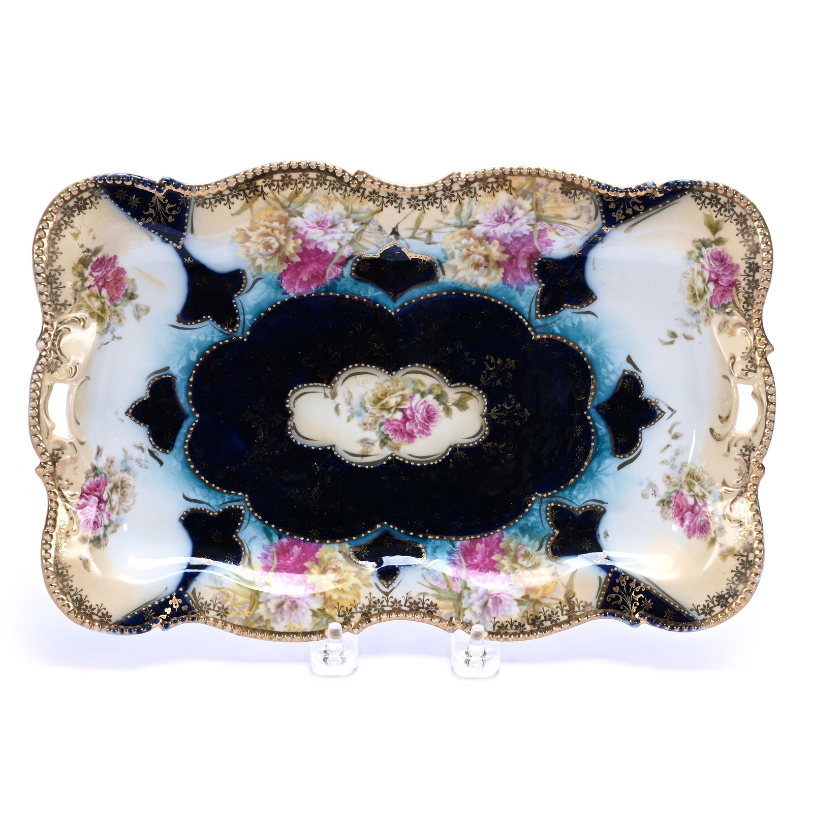Dresser Tray, Unmarked R.S. Prussia (Mold 343): Dresser Tray, Unmarked R.S. Prussia (Mold 343), 11.5 x 7.5 x 1 Inches, Cobalt Blue, Blue, Cream, And White Tones With Floral Decor And Gold Stencil Highlights, 0.8 Pounds. LiveAuctioneers Invoices