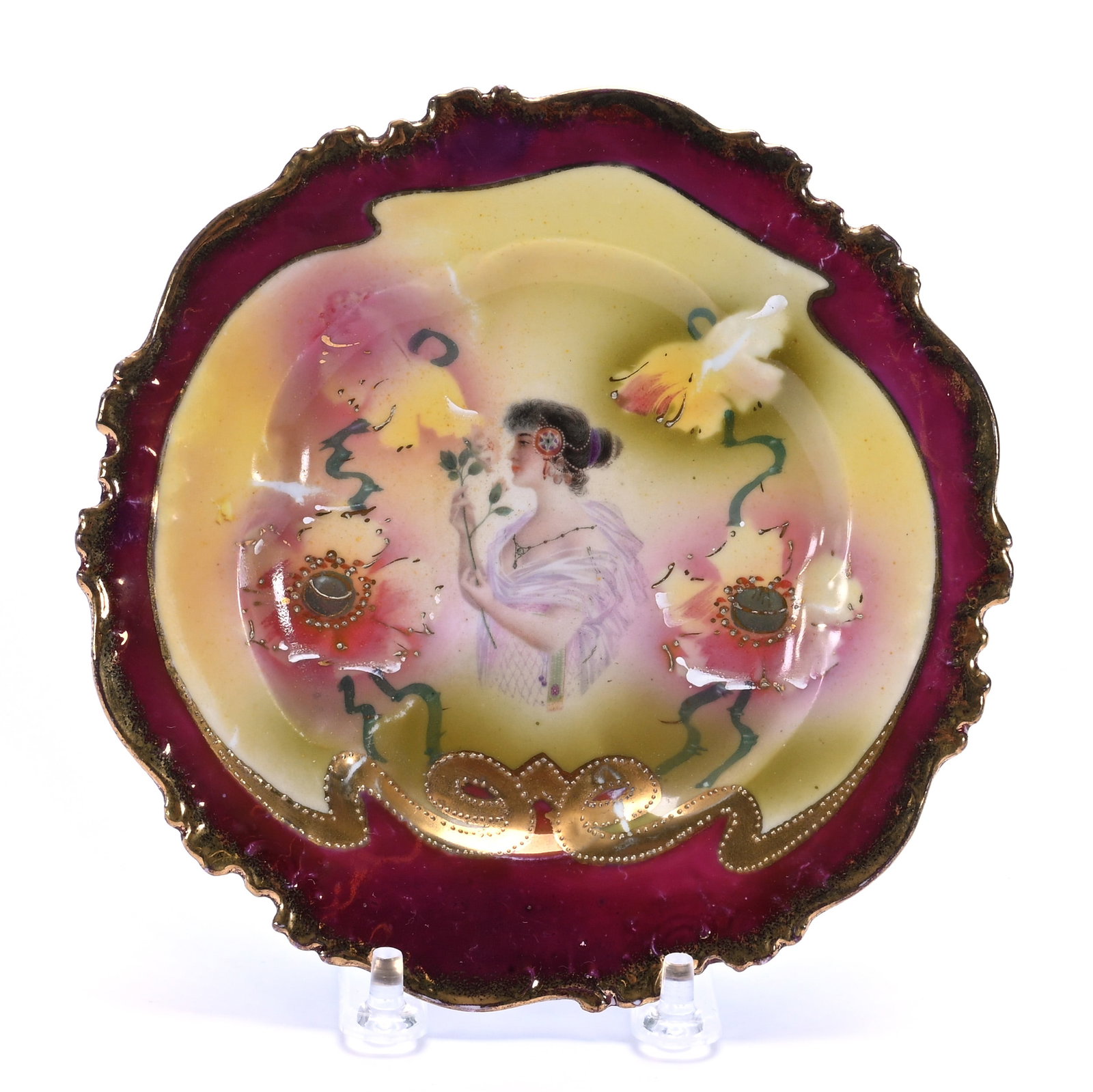 Plate, Marked Prov Saxe: Plate, Marked Prov Saxe, 6.5 x 6.5 x 0.75 Inches, Woman Smelling Rose Portrait, Yellow, Green, And Pink Background With Maroon Border, 0.3 Pounds. LiveAuctioneers Invoices Must Be Paid Using the PAY
