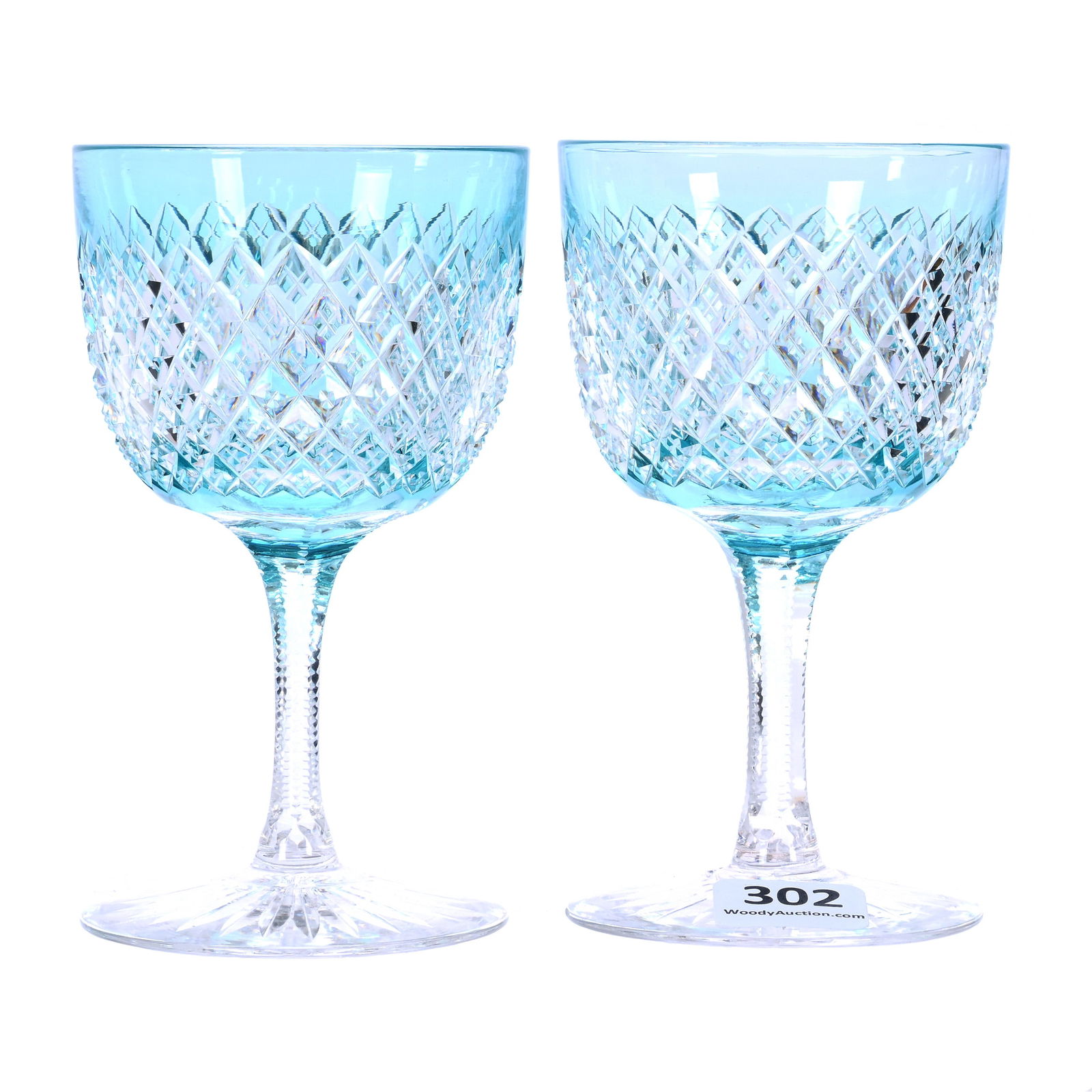 Pair Wine Stems, ABCG, Turquoise Cut To Clear, Crosscut Diamond Pattern: Pair Wine Stems, American Brilliant Cut Glass, Turquoise Cut To Clear, Crosscut Diamond Pattern, 4.5 x 2.625 x 2.625 Inches, Notched Stem, Ray Cut Foot, 1 Pounds, Tennessee Private Collection.