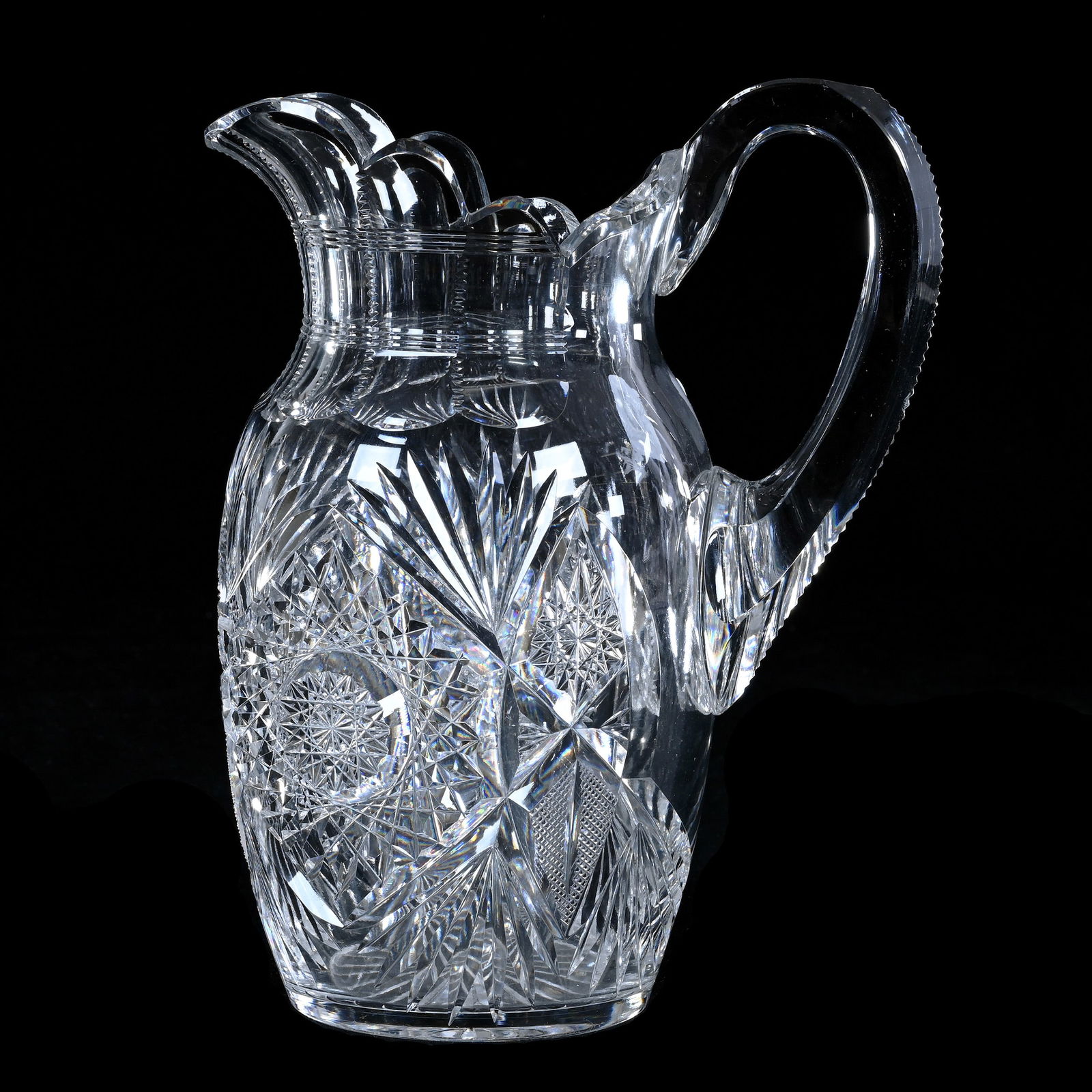 Pitcher, American Brilliant Cut Glass, Monarch Pattern By J. Hoare: Pitcher, American Brilliant Cut Glass, Monarch Pattern By J. Hoare, 8.5 x 6.75 x 4.5 Inches, Ray Cut Base, Clear Blank, 4 Pounds, Richard Lockey Collection, Florida.