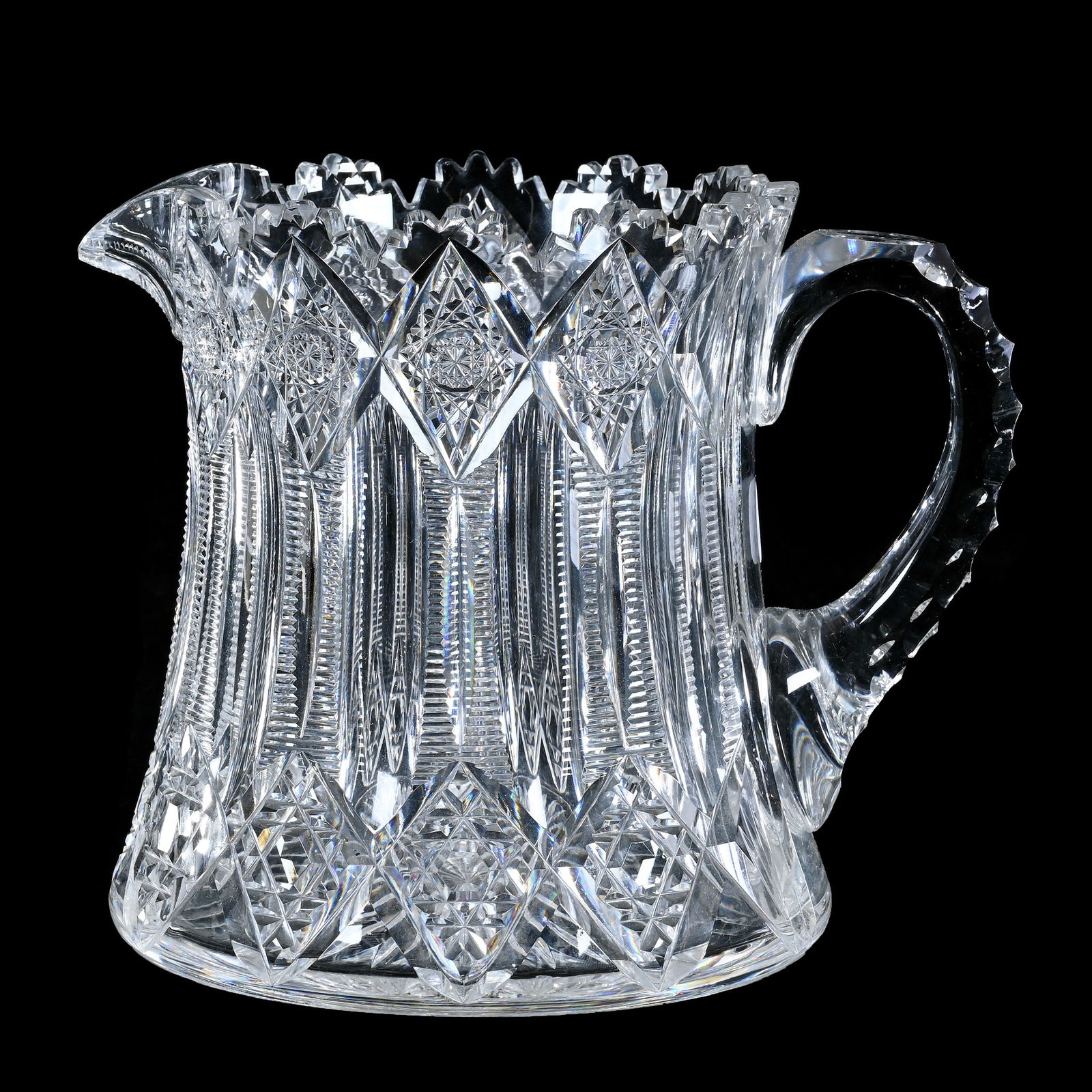 Cider Pitcher, American Brilliant Cut Glass, Signed Hawkes Brunswick Pattern: Cider Pitcher, American Brilliant Cut Glass, Signed Hawkes Brunswick Pattern, 6.25 x 7.5 x 6 Inches, Triple Notched Handle, Ray Cut Base, 4 Pounds, Pennsylvania Private Collection.
