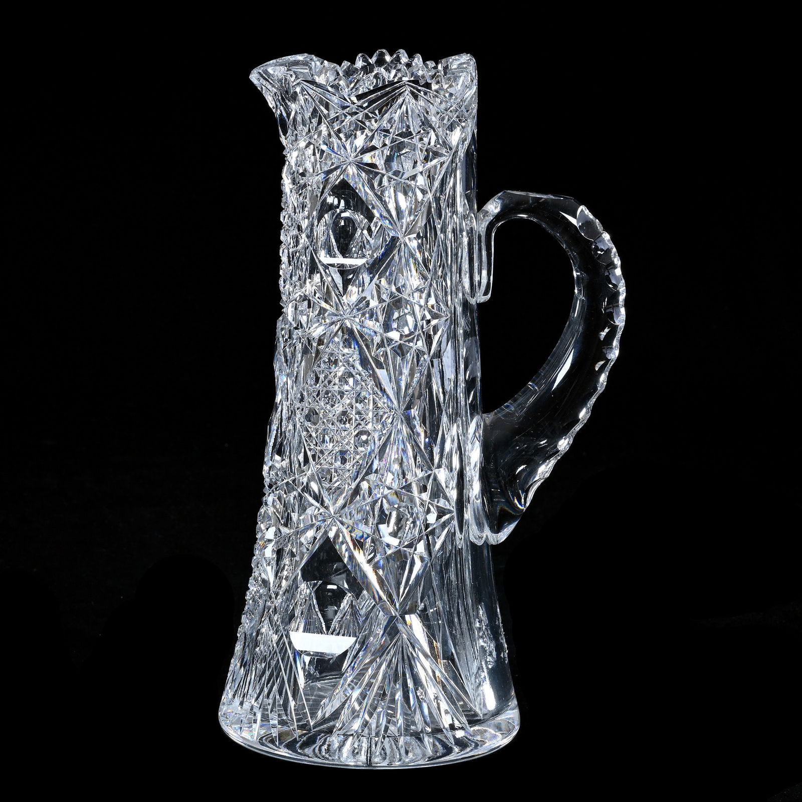 Tankard, American Brilliant Cut Glass, Hobstar, Cane, Bullseye And Fan Motif: Tankard, American Brilliant Cut Glass, Hobstar, Cane, Bullseye And Fan Motif, 11.25 x 6.25 x 5 Inches, Double Notched Handle, Ray Cut Base, Clear Blank, 6 Pounds, Richard Lockey Collection, Florida.