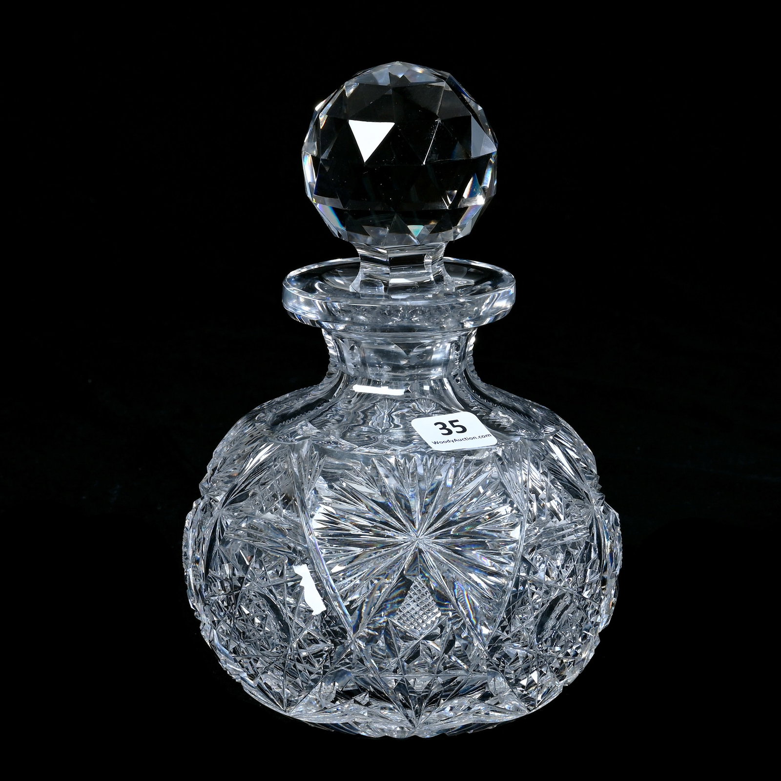 Cologne Bottle, American Brilliant Cut Glass, Fredericka Pattern Designed By W.C. Anderson: Cologne Bottle, American Brilliant Cut Glass, Fredericka Pattern Designed By W.C. Anderson, 7.75 x 5 x 5 Inches, Ray Cut Base, Sliver Chip On Stopper Plug, 3.6 Pounds, Mitchell Caughman Collection, Co