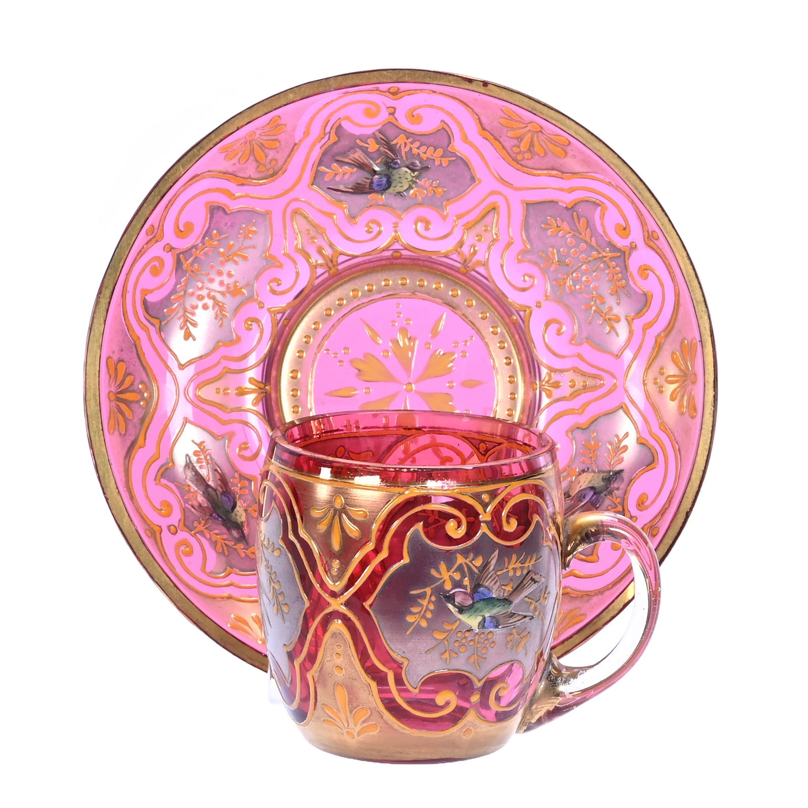 Cup And Saucer, Unmarked Moser Cranberry Art Glass: Cup And Saucer, Unmarked Moser Cranberry Art Glass, 2.25 x 4.25 x 4.25 Inches, Gold And Silver Enamel Border With Bird Highlights, 0.3 Pounds, Jeff David Collection, Missouri.