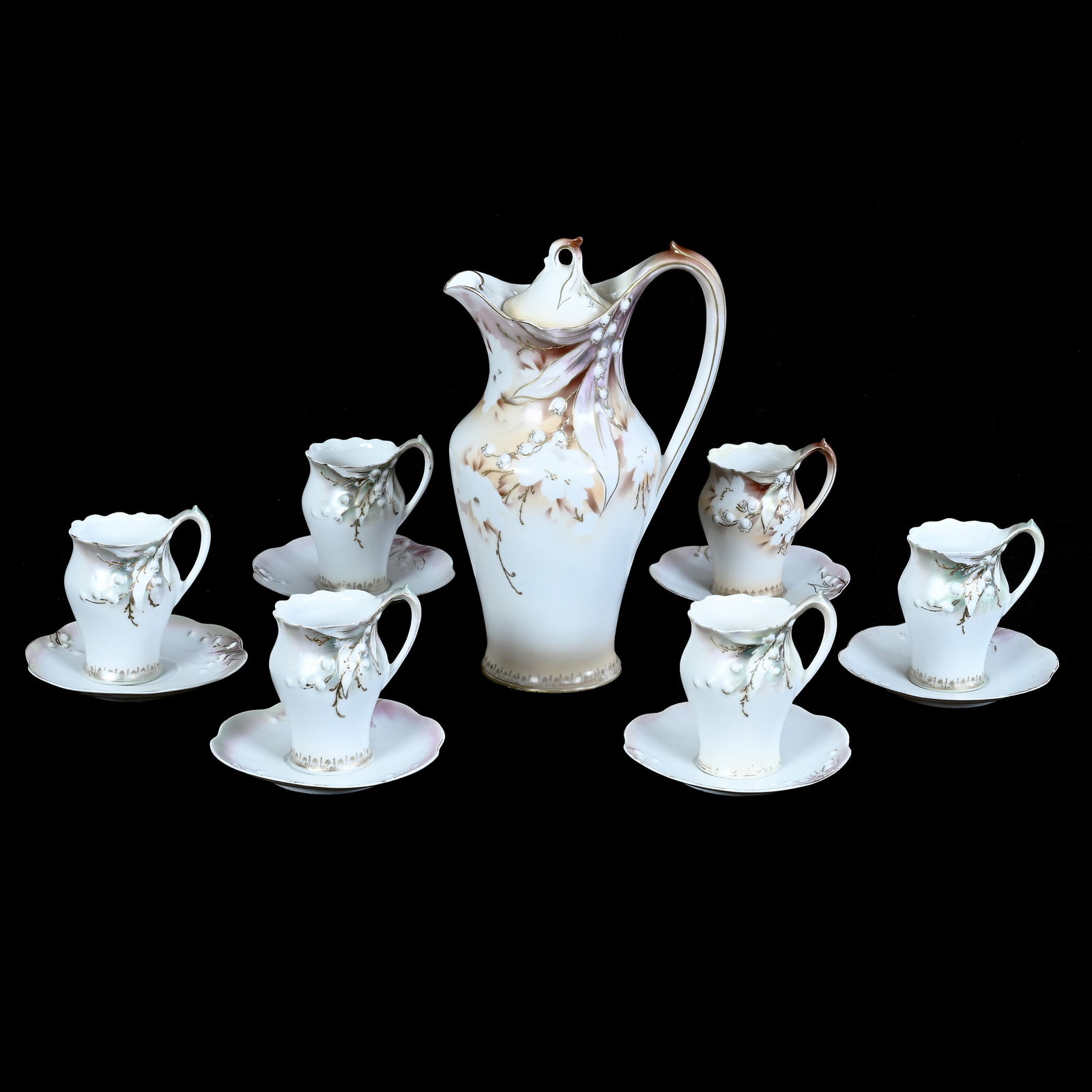 Chocolate Set, Marked R.S. Prussia, Lily Of The Valley Mold: Chocolate Set, Marked R.S. Prussia, Lily Of The Valley Mold, Brown And White Satin Finish, Chocolate Pot, 9.75 x 5.5 x 4.5 Inches, (6) 4" x 4.75" Cups And Saucers, One Cup With Rim Chip And Crack, Pri