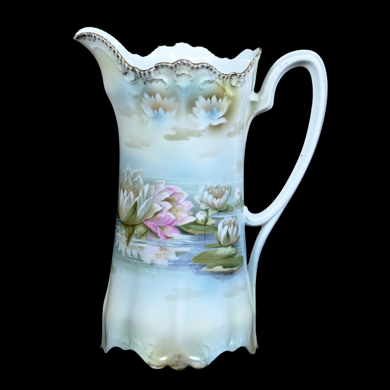 Pitcher, Marked R.S. Prussia, Mold 584: Pitcher, Marked R.S. Prussia, Mold 584, Water Lily Decor, Green, Blue, And Yellow Tones, 9.75 x 7.5 x 4.75 Inches, Ronald & Carolyn Smith Collection, Ohio, 1.5 Pounds. Effective 6/6/26, All