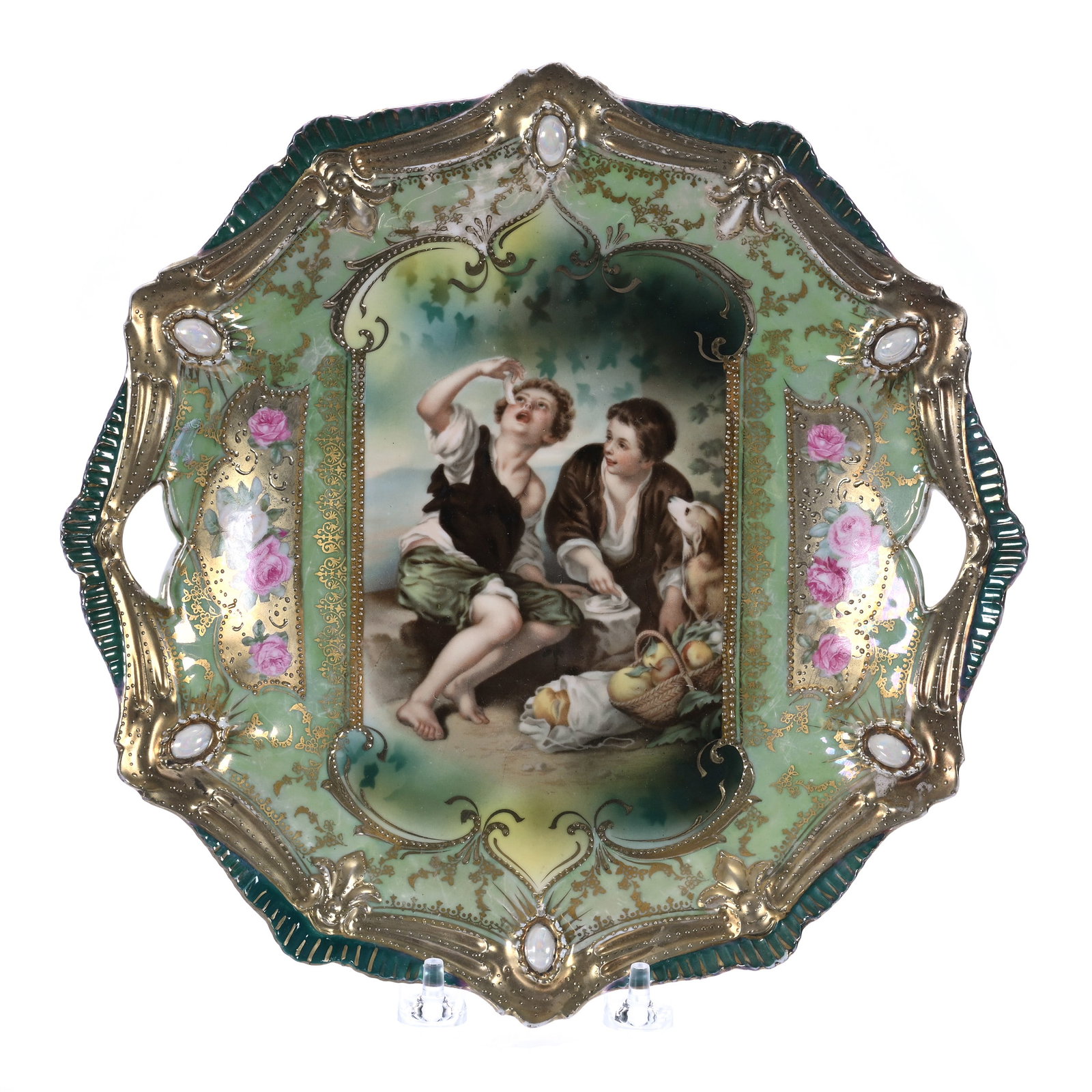 Two Handled Cake Plate, Marked R.S. Prussia, Ribbon And Jewel Mold: Two Handled Cake Plate, Marked R.S. Prussia, Ribbon And Jewel Mold, Melon Eater Scenic Decor, Opal Jewels And Nice Gold Highlights, 10.5 x 10.5 x 1.25 Inches, Joe Nettleton Collection, Iowa, 0.8