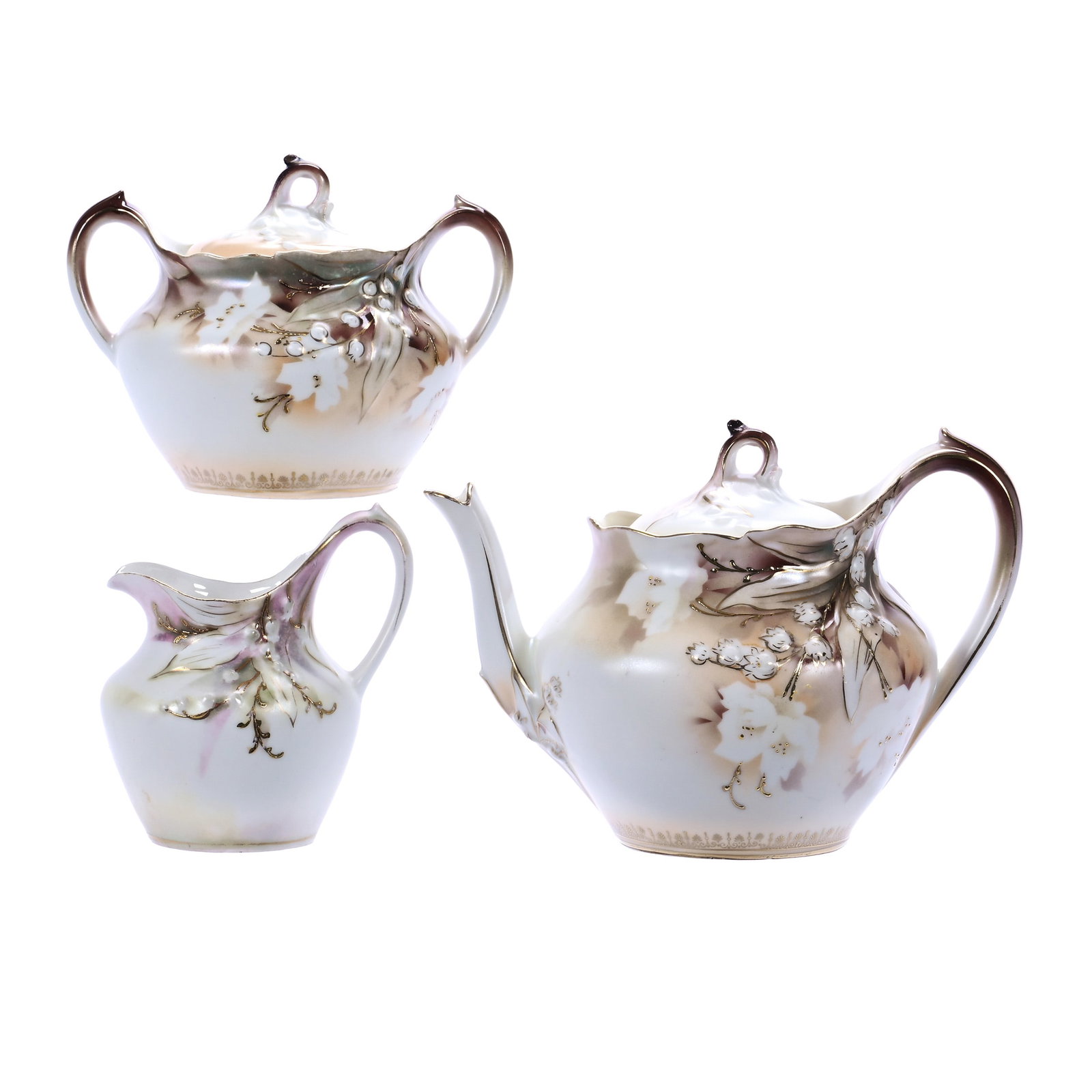 (3) Piece Tea Set, Unmarked R.S. Prussia, Lily Of The Valley Mold: (3) Piece Tea Set, Unmarked R.S. Prussia, Lily Of The Valley Mold, Cream, Green, And White Satin Finish, The Coloration Is A Little Off On The Creamer, 5.25 x 7.5 x 4.75 Inches, Private Collection, In