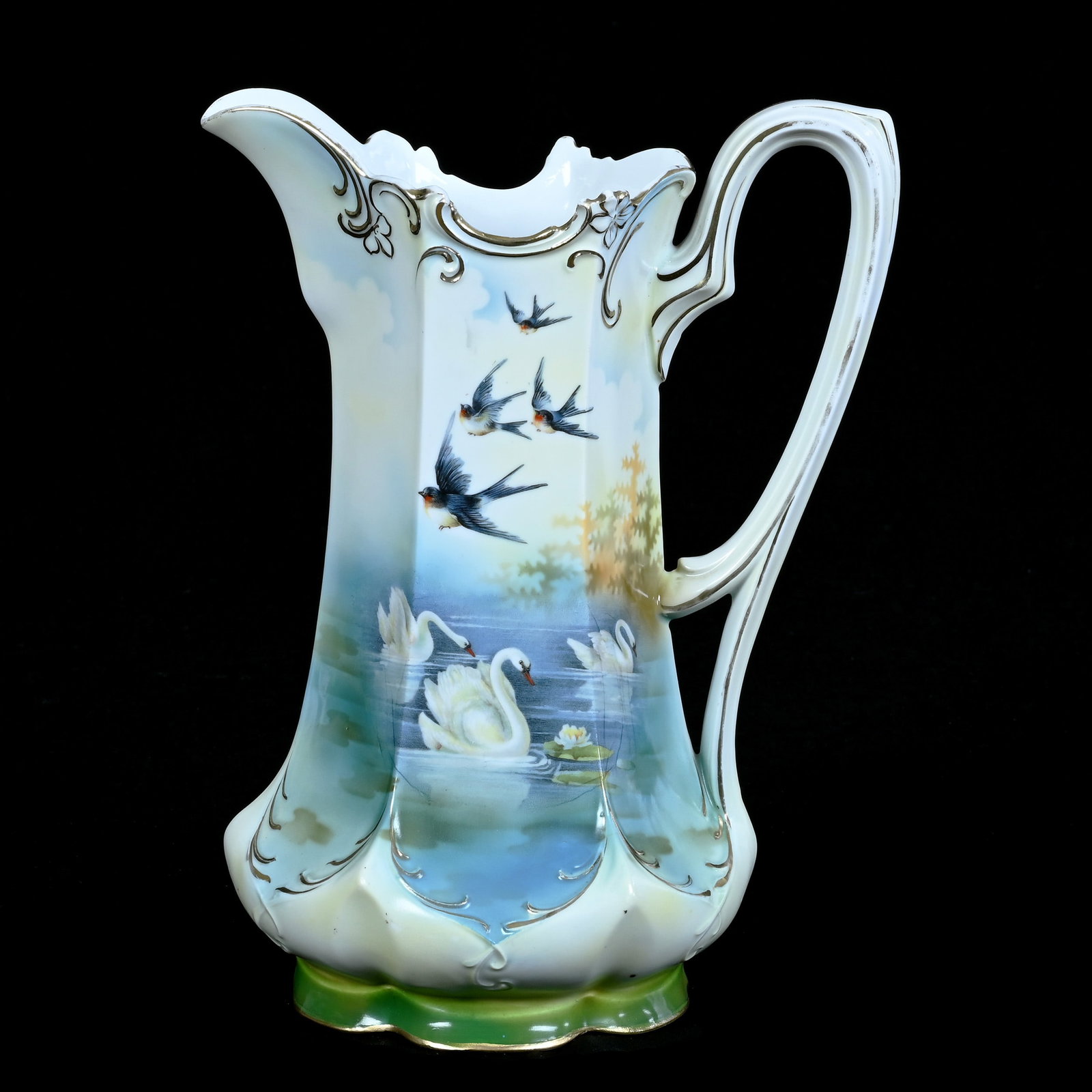 Pitcher, Marked R.S. Prussia, Mold 570: Pitcher, Marked R.S. Prussia, Mold 570, Blue, Green, And Yellow Tones With Swan And Bluebird Scenic Decor, 11.5 x 8.5 x 6 Inches, Private Collection, Indiana, 2.7 Pounds. Effective 6/6/26, All