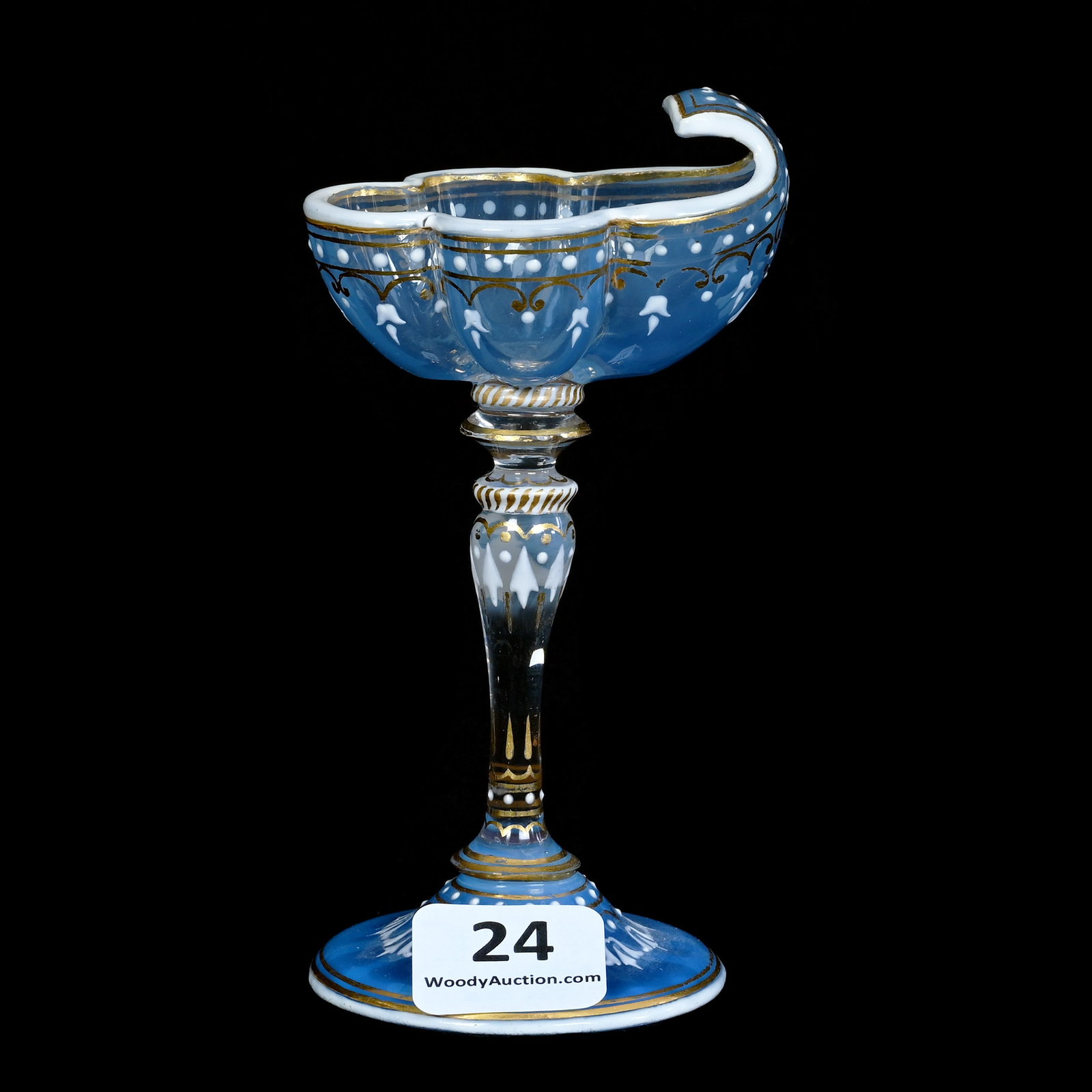 Shell Shaped Cordial, Lobmeyr: Shell Shaped Cordial, Lobmeyr, 4.25 x 2.25 x 2 Inches, Blue Opaline Art Glass, White Enamel And Gold Highlights, Circa 1880, 0.1 Pounds, Barbara Shulhof Estate. Effective 6/6/26, All LiveAuctioneers I