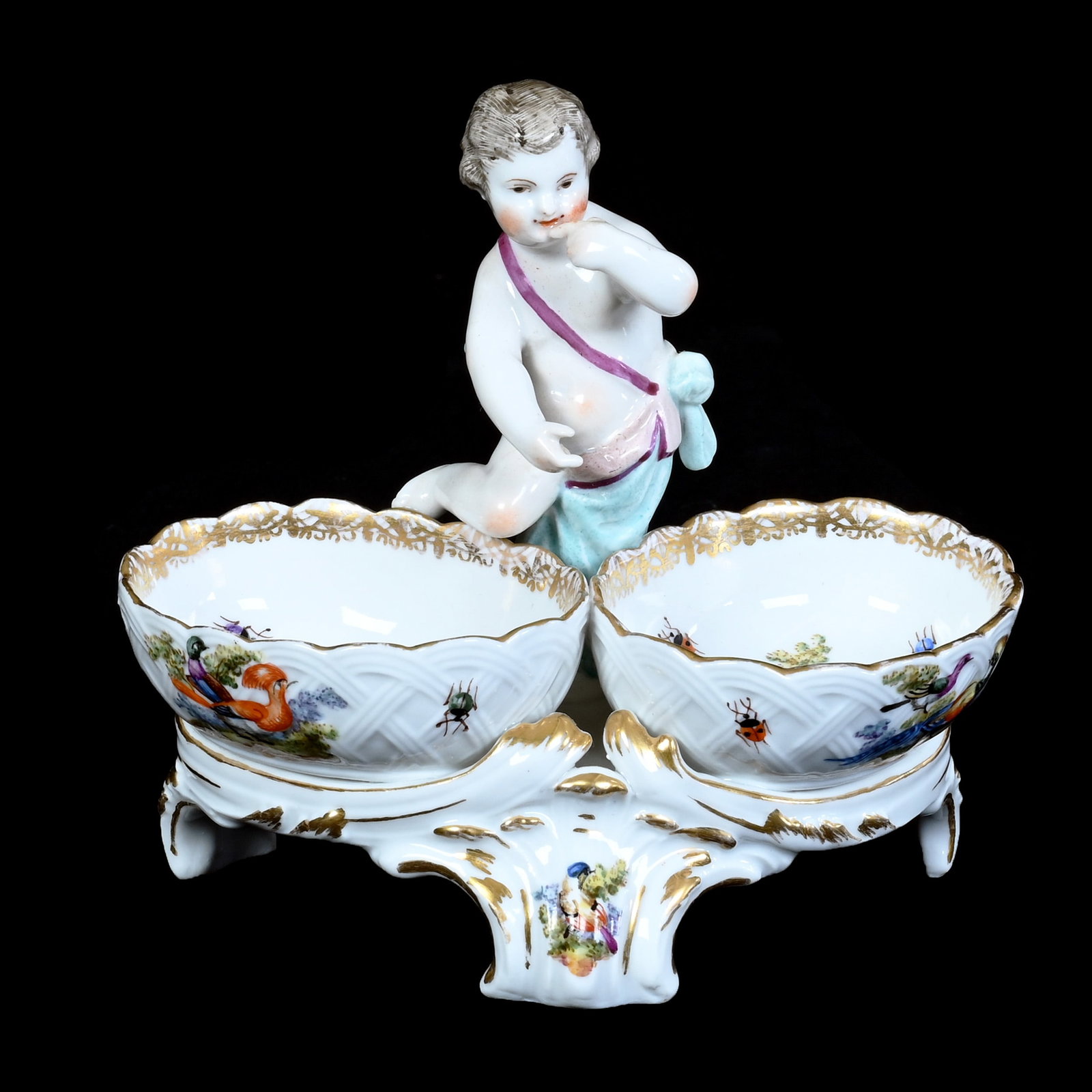 Double Salt Cellar, Blue K.P.M. Porcelain Mark: Double Salt Cellar, Blue K.P.M. Porcelain Mark, 5 x 5.25 x 3.5 Inches, Cherub Between Two Bowls With Bird And Insect Decor, Blue Sceptre Mark, 0.6 Pounds, Barbara Shulhof Estate. Effective 6/6/26, All