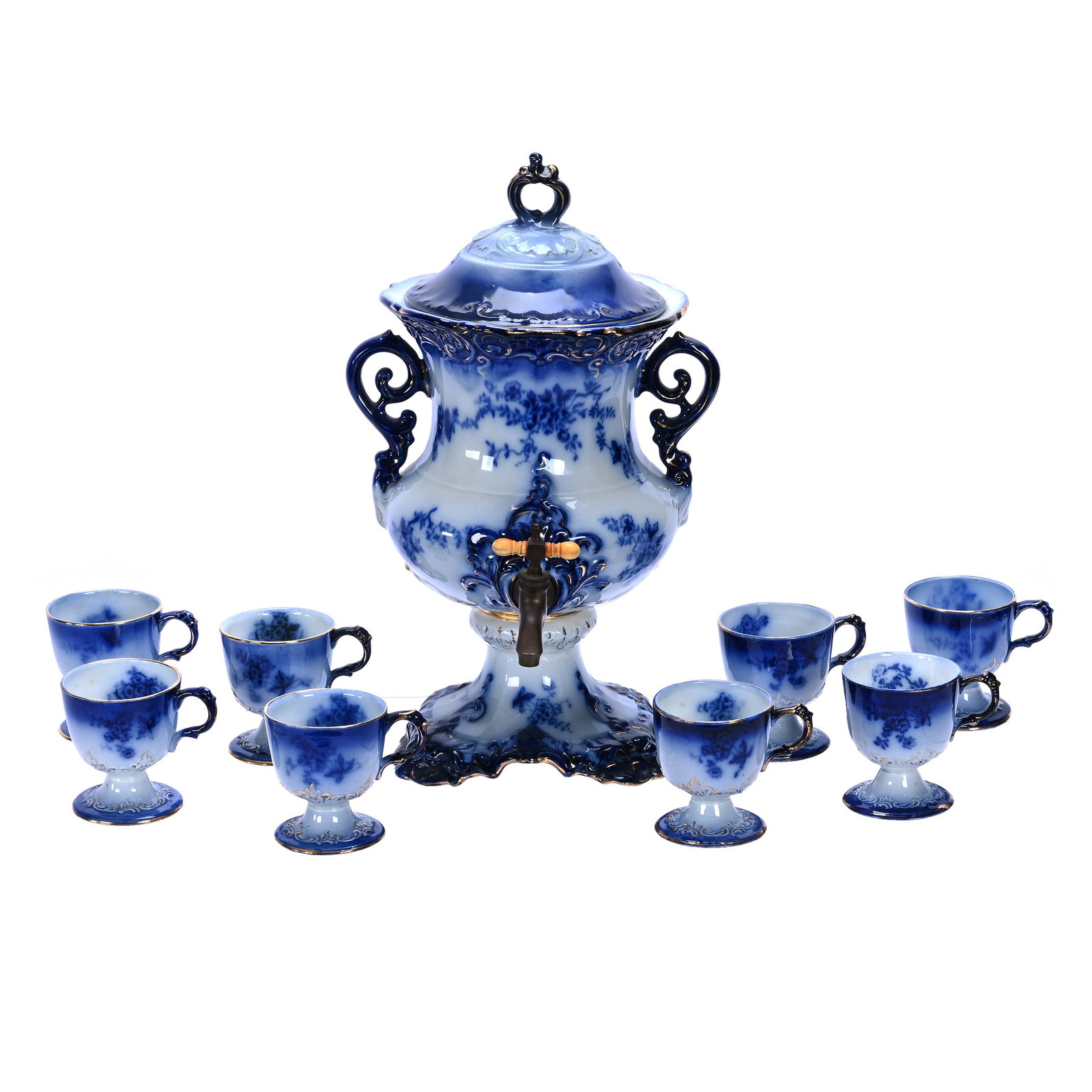 Samovar, Flow Blue Marked The Wheeling Pottery Company: Samovar, Flow Blue Marked The Wheeling Pottery Company, 15.5 x 9.5 x 10.5 Inches, Original Spigot And Lid, Floral Decor, Sells With (8) 3.25" X 3.75" X 3" Pedestal Cups, Lid Has Possible Professional