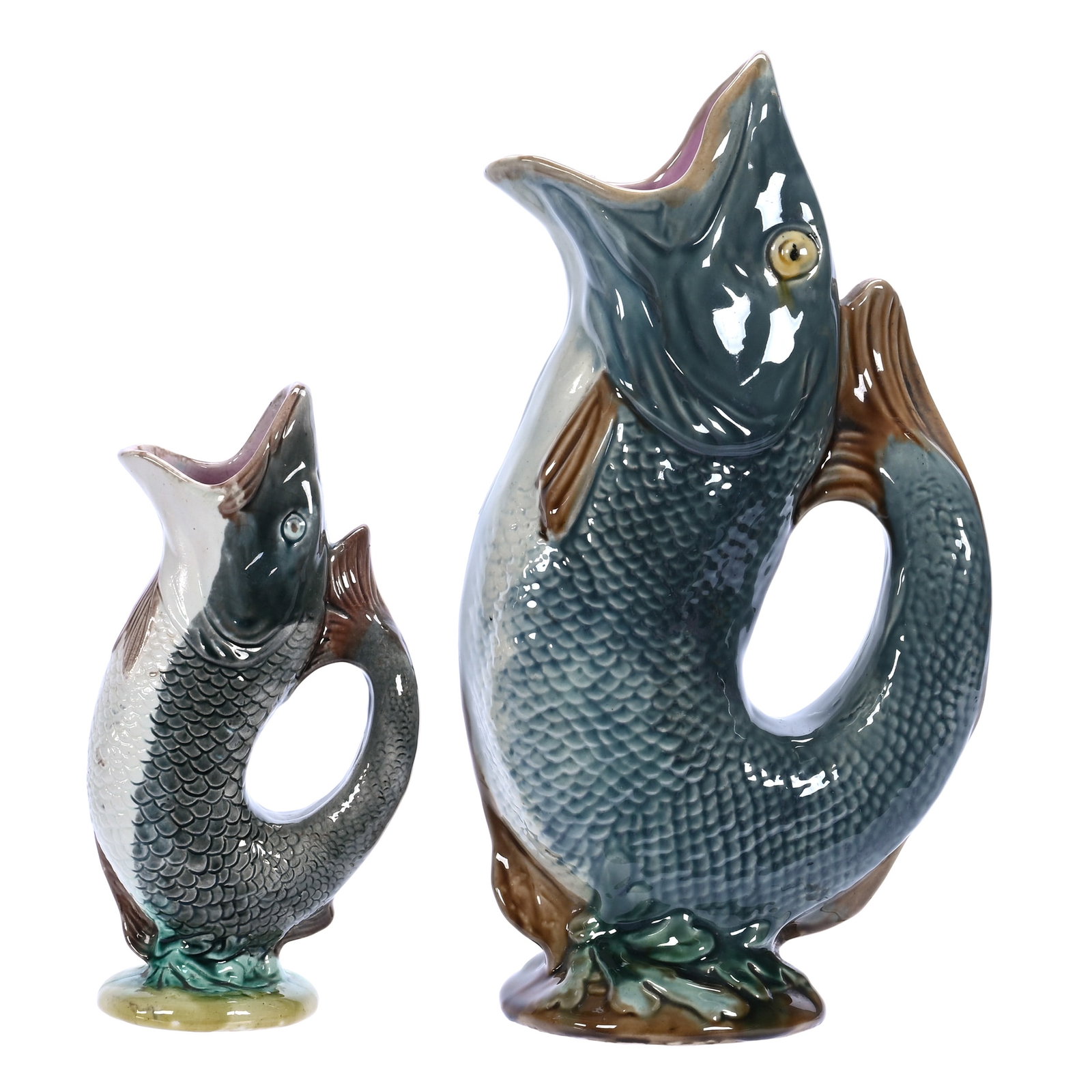 (2) English Majolica Glug Jugs, Standing Fish, Circa 1880's: (2) English Majolica Glug Jugs, Standing Fish, Circa 1880's, 12.75 x 6.75 x 4.5 Inches, Gray And White Tones, The Smaller Jug Measures 8.25" Tall, 4 Pounds, Barbara Shulhof Estate. Effective 6/6/26, A