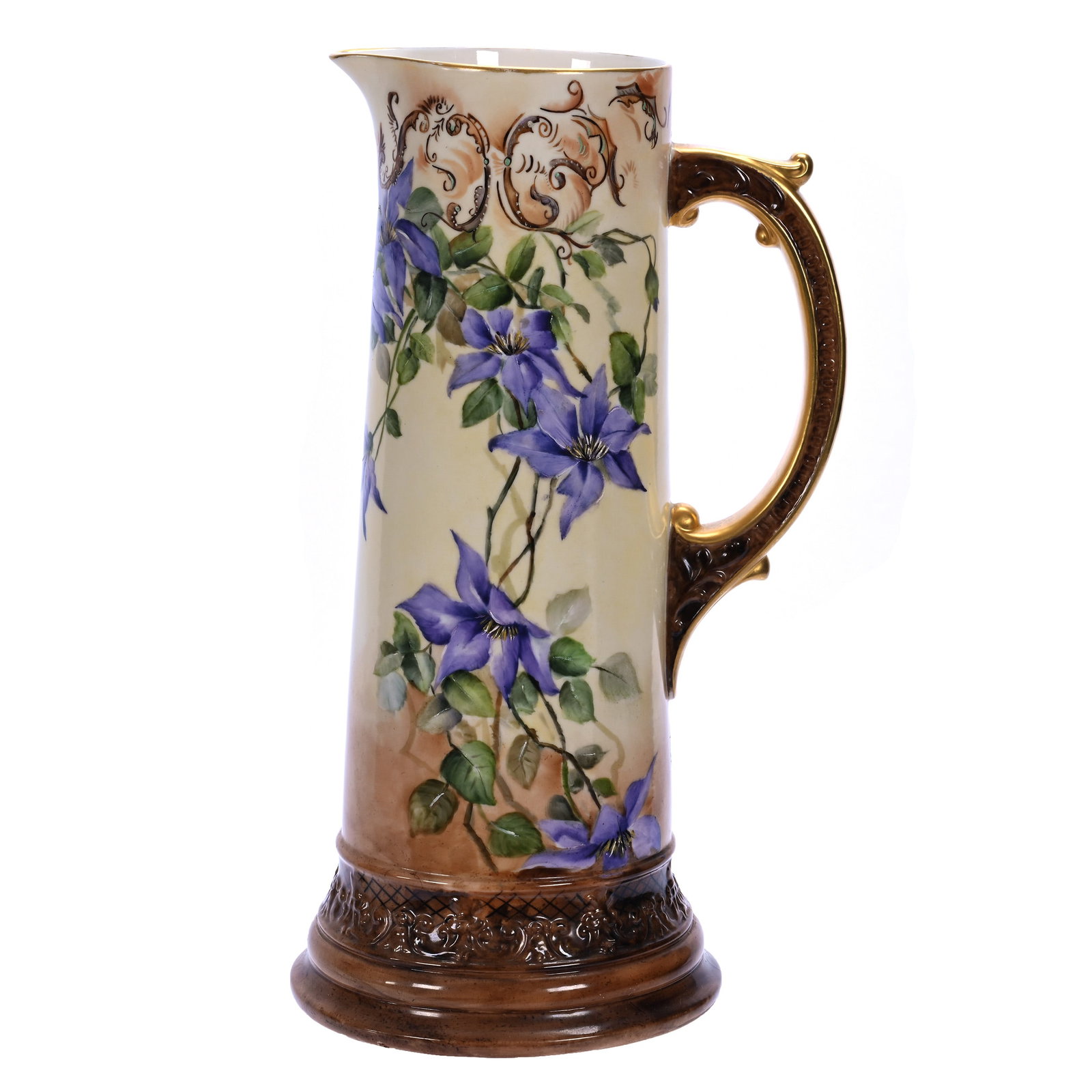 Tankard, Marked C.A.C. Belleek (Ceramic Arts Company): Tankard, Marked C.A.C. Belleek (Ceramic Arts Company), 14.5 x 8 x 6.5 Inches, Cream And Brown Tones With Lavender Floral Decor, 4.4 Pounds, William "Bill" Wright Collection, Wisconsin. Effective 6/6/2