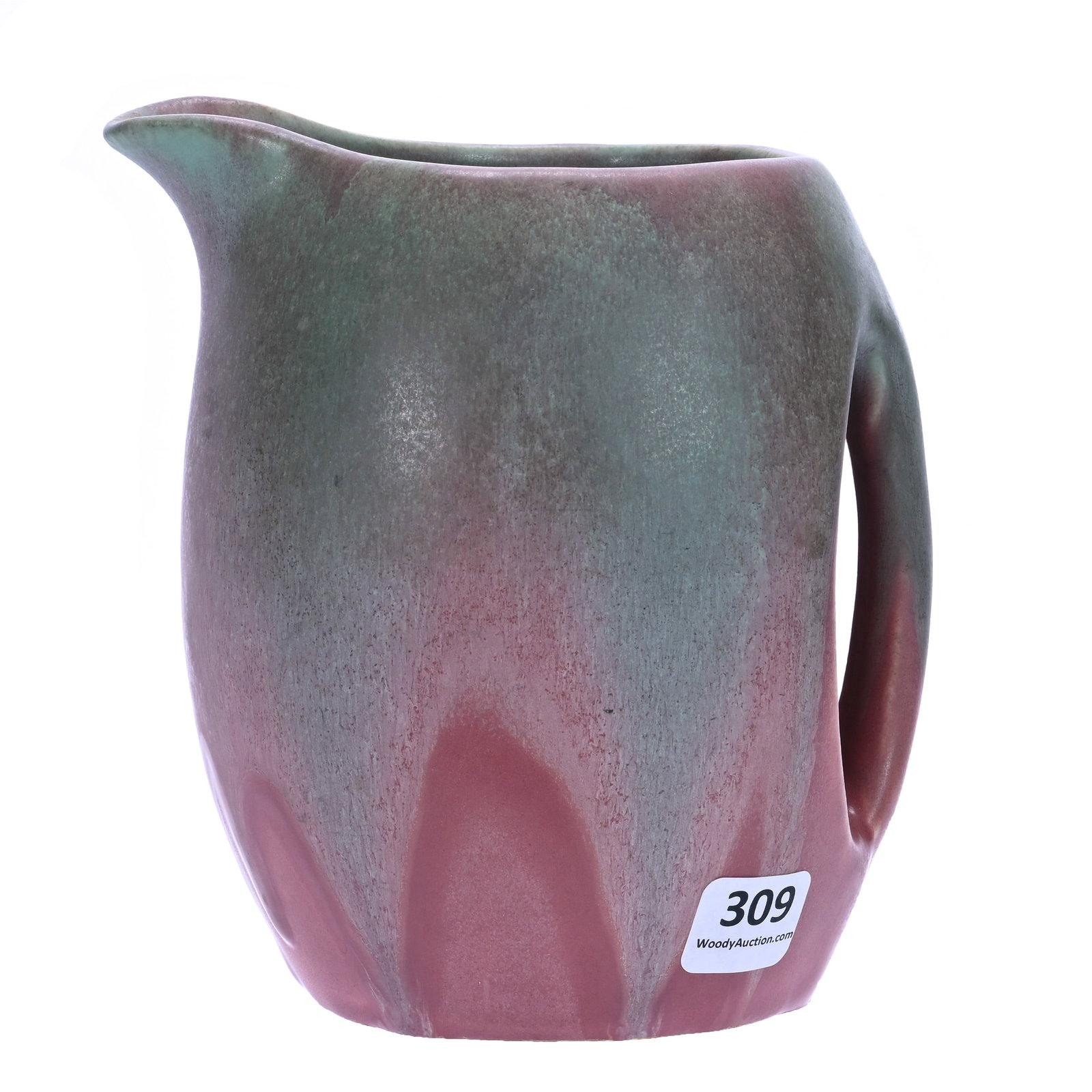 Pitcher, Marked Muncie Art Pottery: Pitcher, Marked Muncie Art Pottery, 5.75 x 5.25 x 4.5 Inches, Pink With Green Drip Glaze, 1.7 Pounds, Douglas Millhoff Collection, Ohio. Effective 6/6/26, All LiveAuctioneers Invoices Must Be Paid Usi