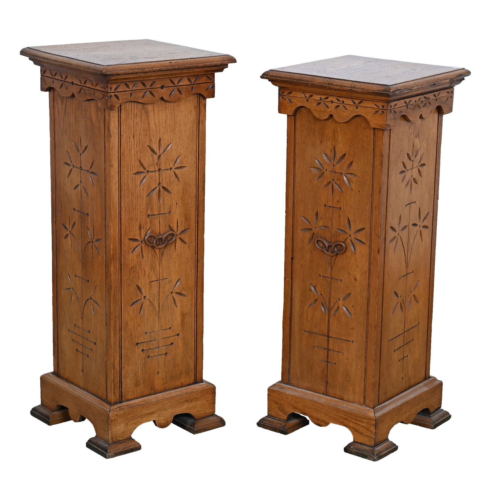 (2) Four Sided Plant Stands, Oak: (2) Four Sided Plant Stands, Oak, 37.25 x 15 x 14.5 Inches, Floral And Interlocking Ring Design, One Pedestal Is Shorter At 36" Height, Approximate Weight Provided. Woody Auction Cannot Ship This