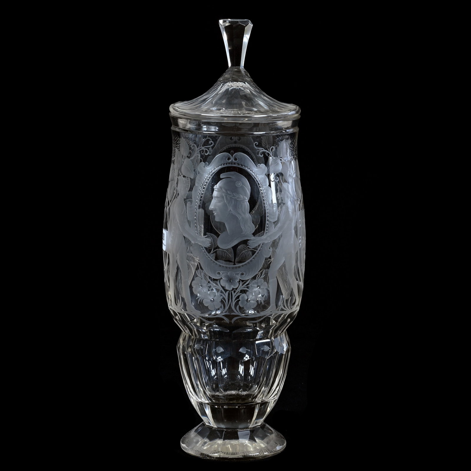 Covered Jar, Bohemian Art Glass: Covered Jar, Bohemian Art Glass, 15.25 x 4.75 x 4.75 Inches, Clear With Finely Engraved Medallion Portrait Figures, Crest And Vine Motif, 4.2 Pounds, Cliff And Myra Bilbo Collection, TN, Effective